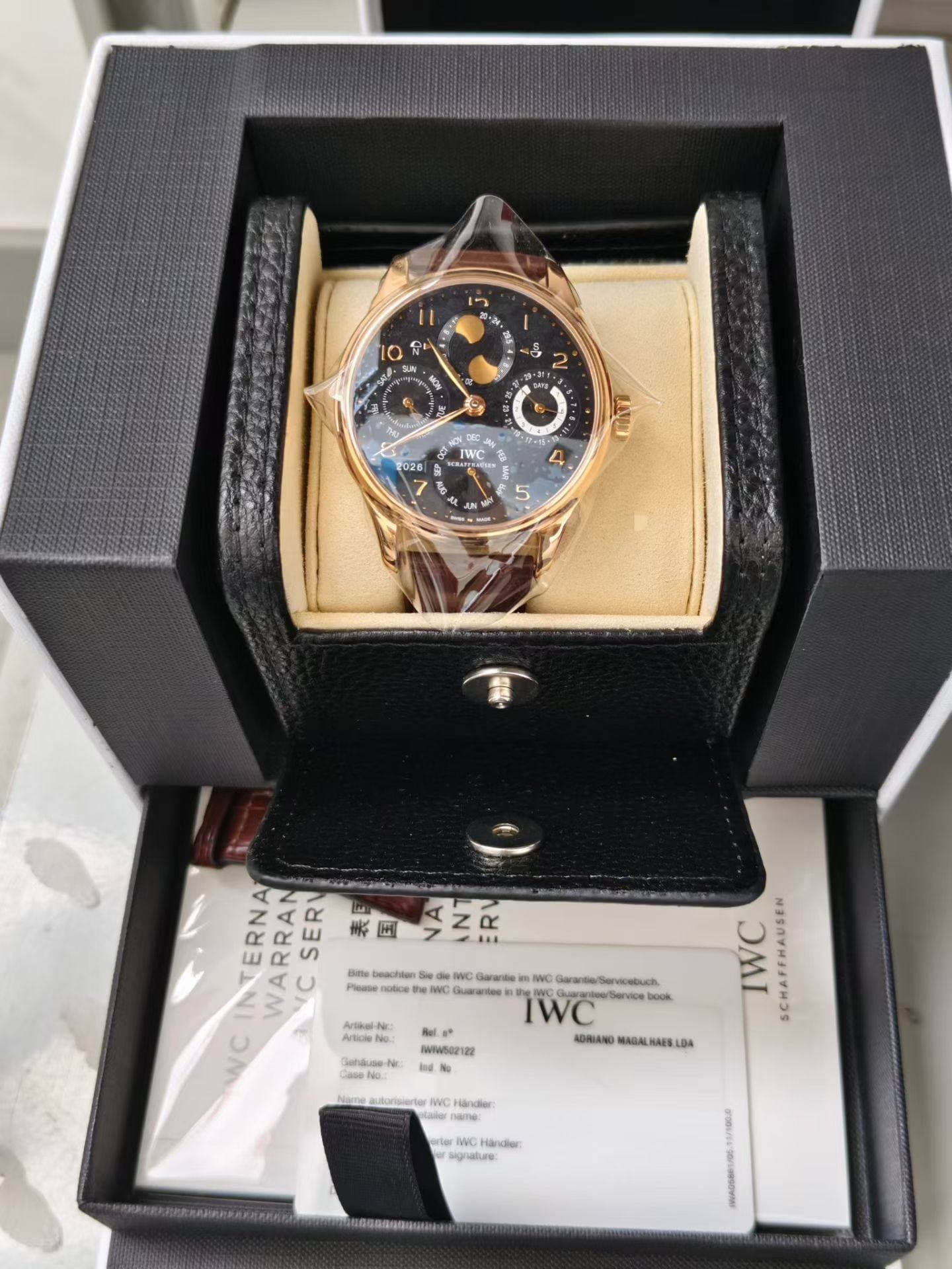 May be an image of wrist watch and text