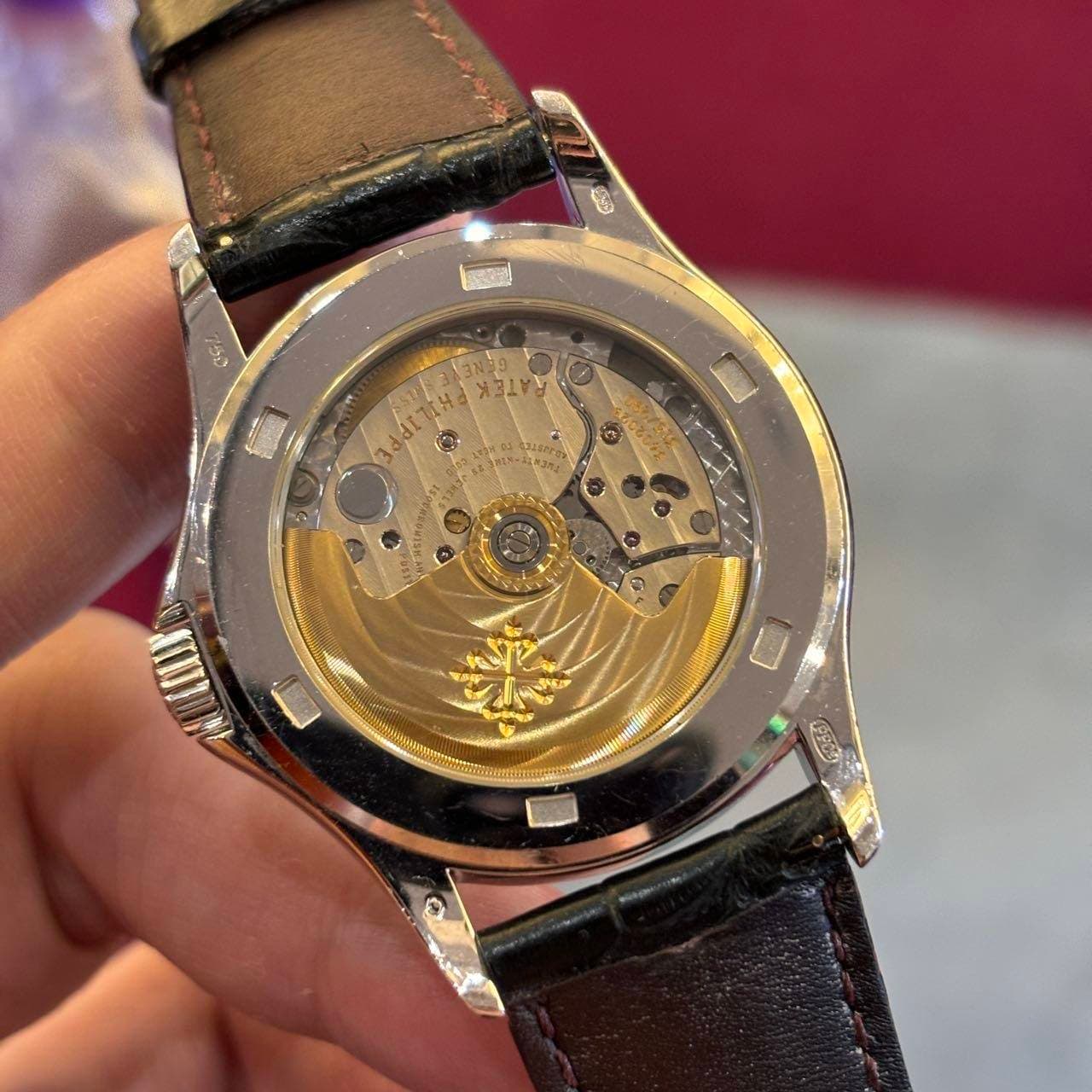 May be an image of wrist watch and text