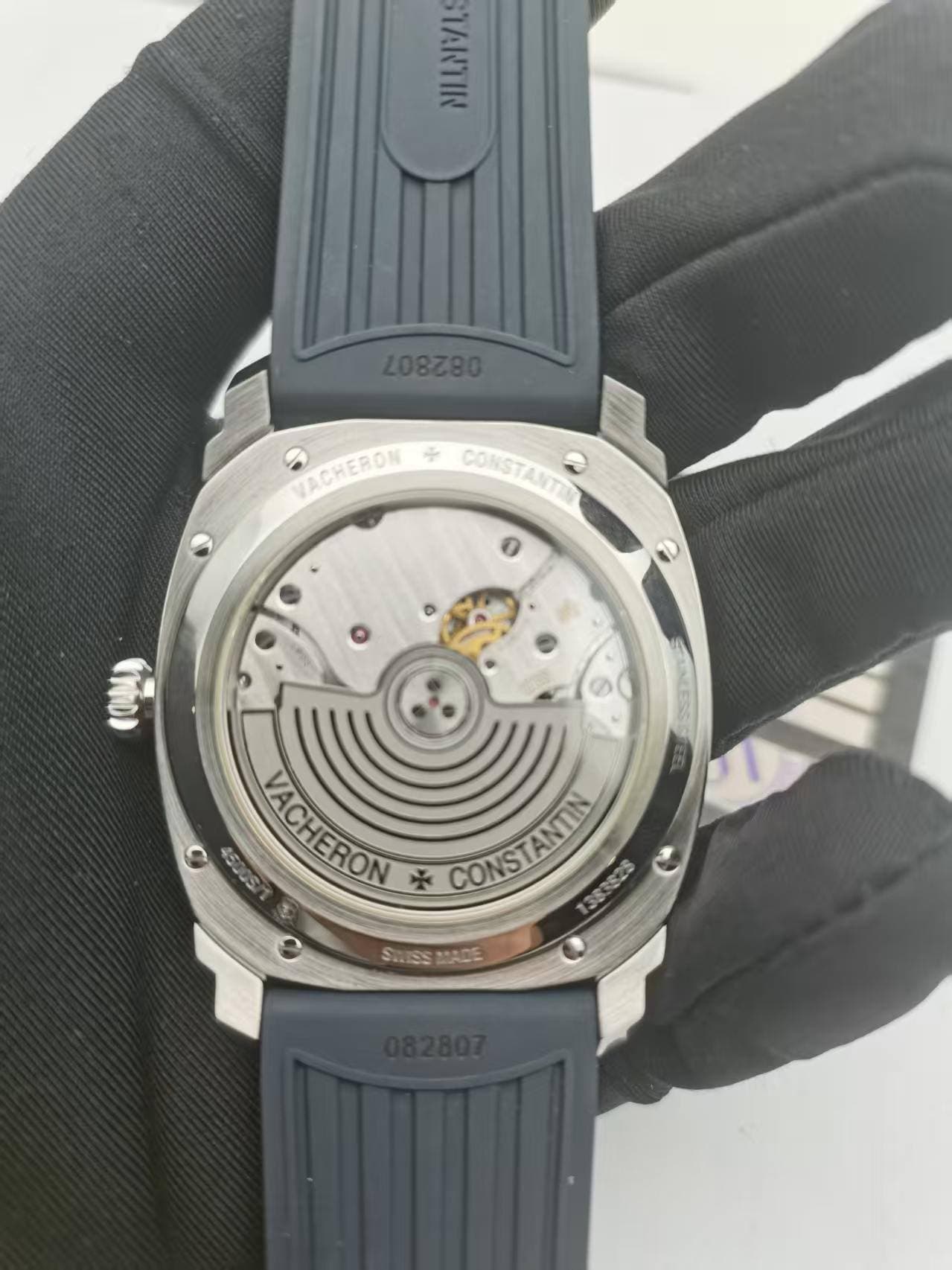 May be an image of wrist watch and text