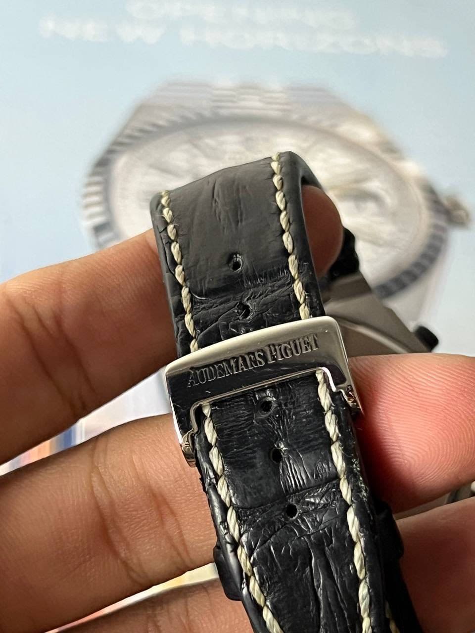 May be an image of wrist watch and text that says 'YARSHIGUEL'
