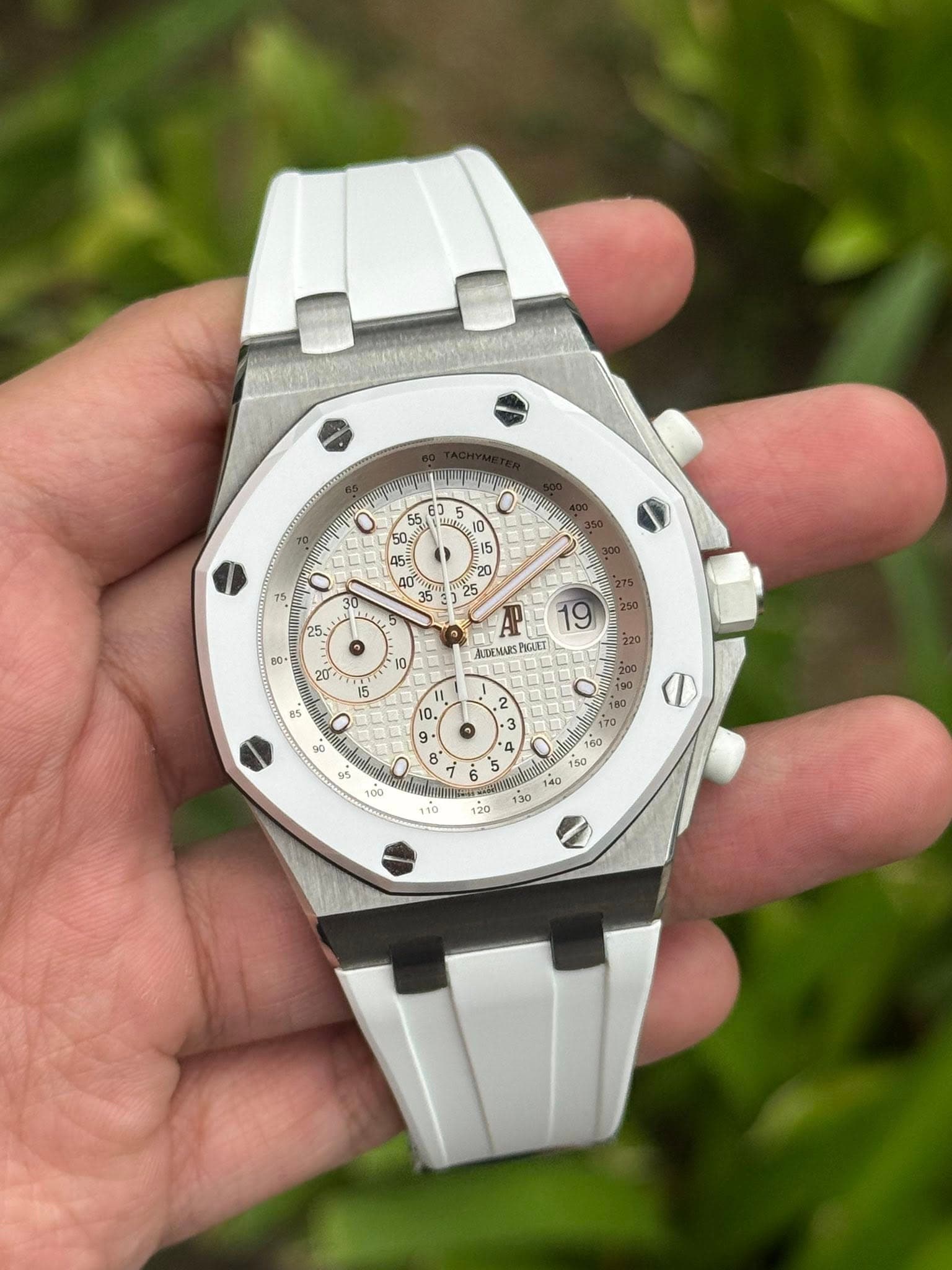 May be an image of wrist watch and text