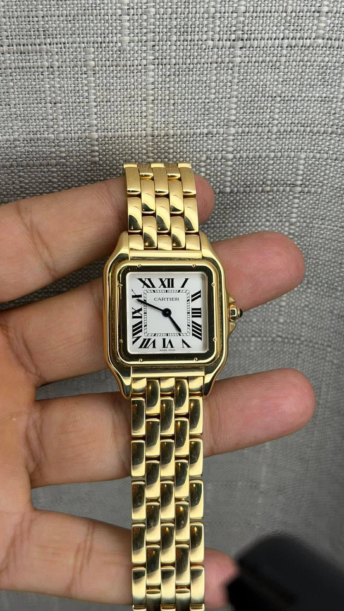 May be an image of digital watch and text