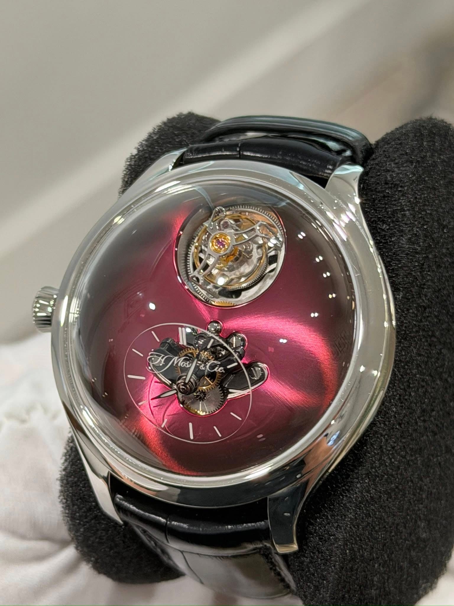 May be an image of wrist watch and text