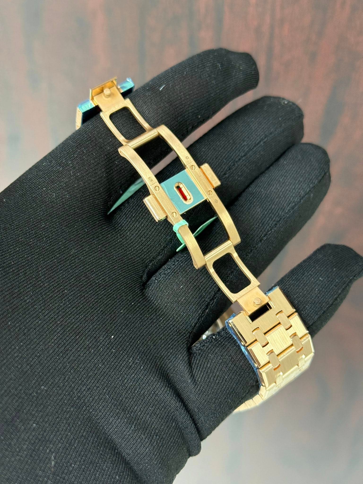 May be an image of jewelry and wrist watch