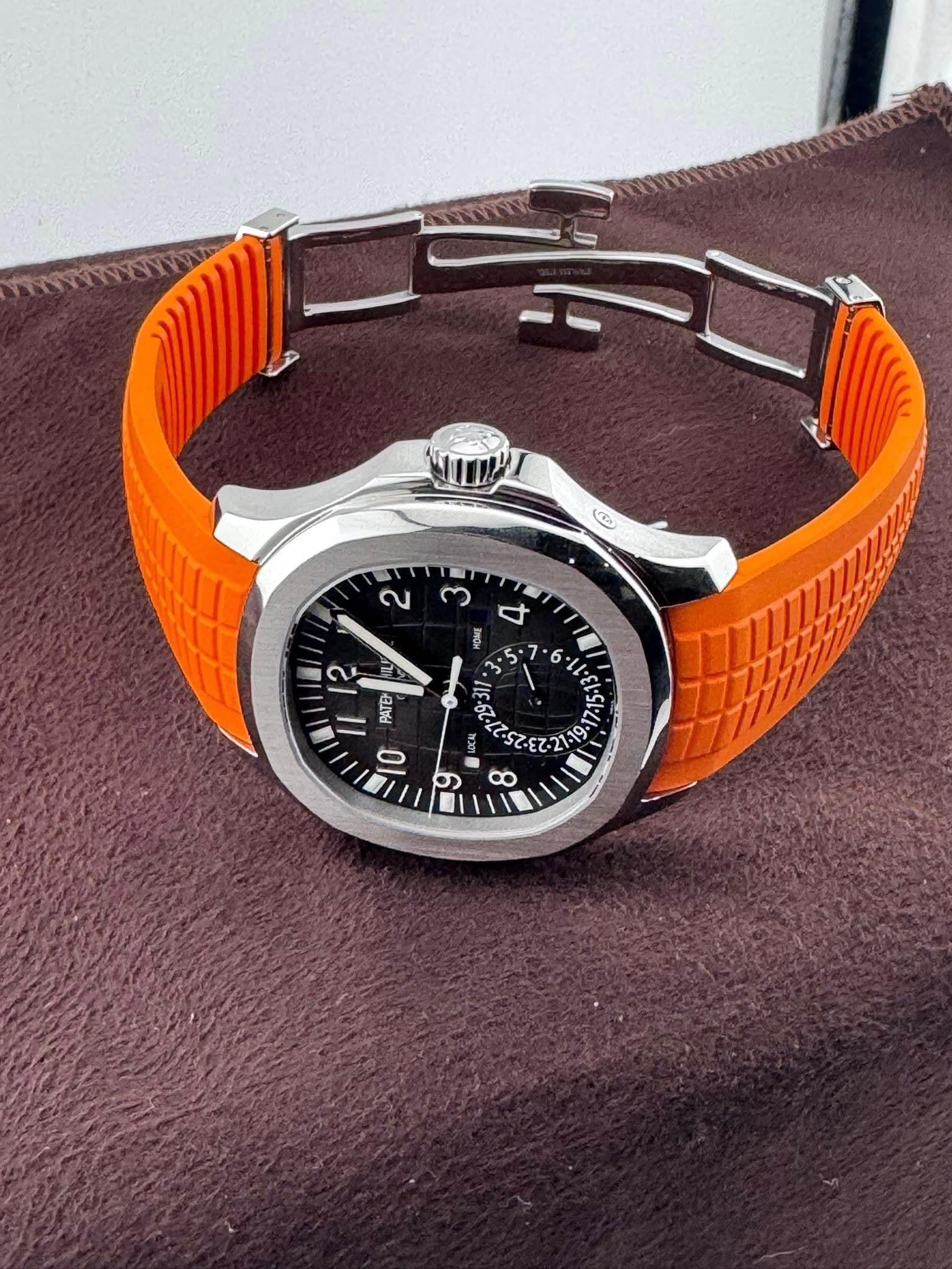 May be an image of wrist watch and text that says 'NInI E م ന ك a 3 3l1 2 A PATE 10 9. 9 ထ'