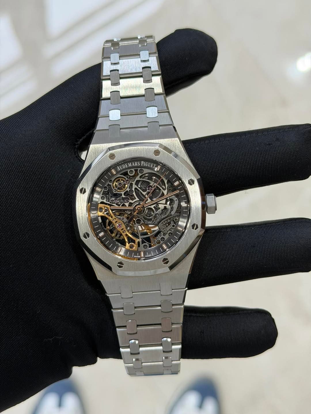 May be an image of wrist watch and text