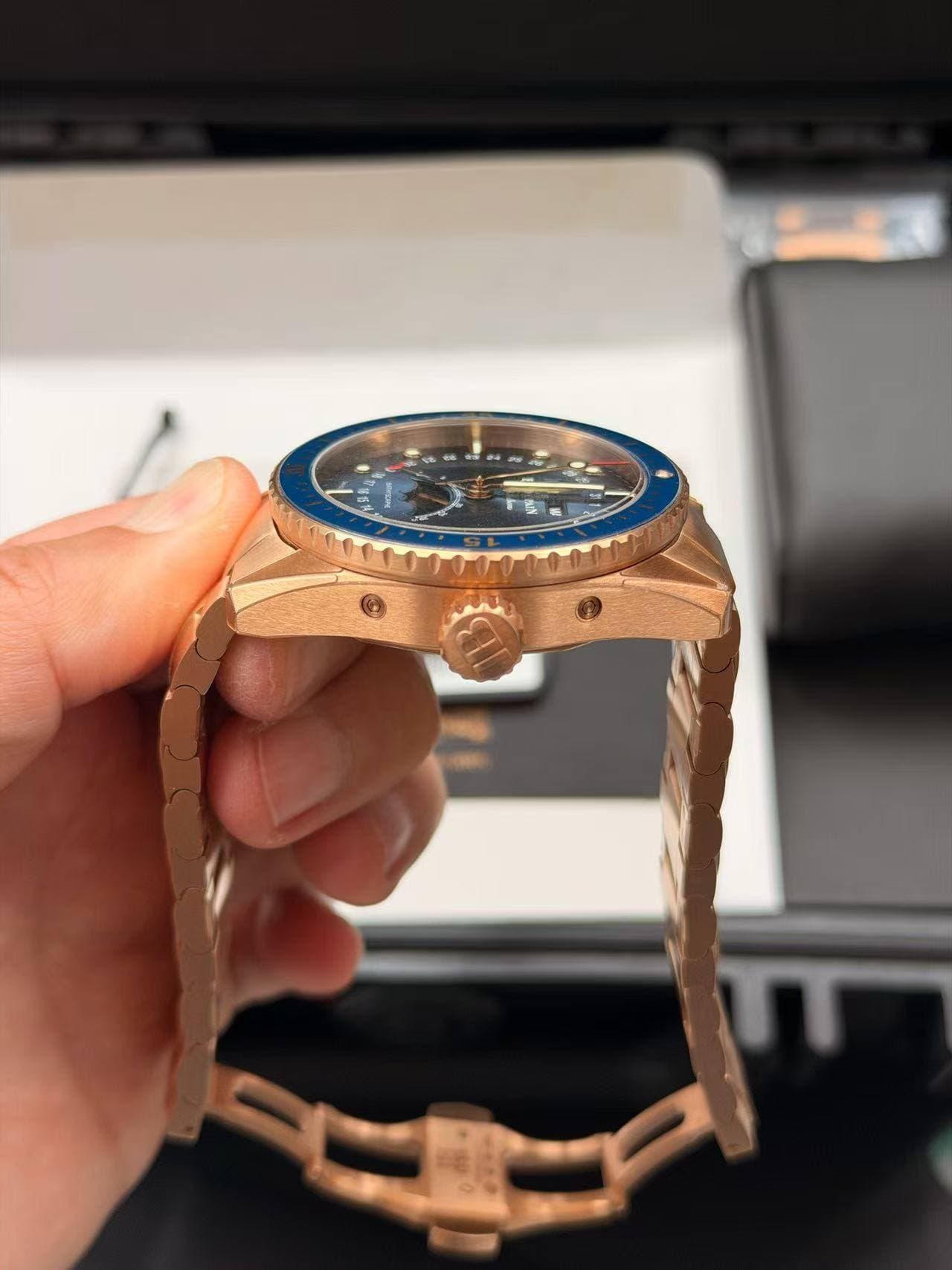 May be an image of wrist watch and text