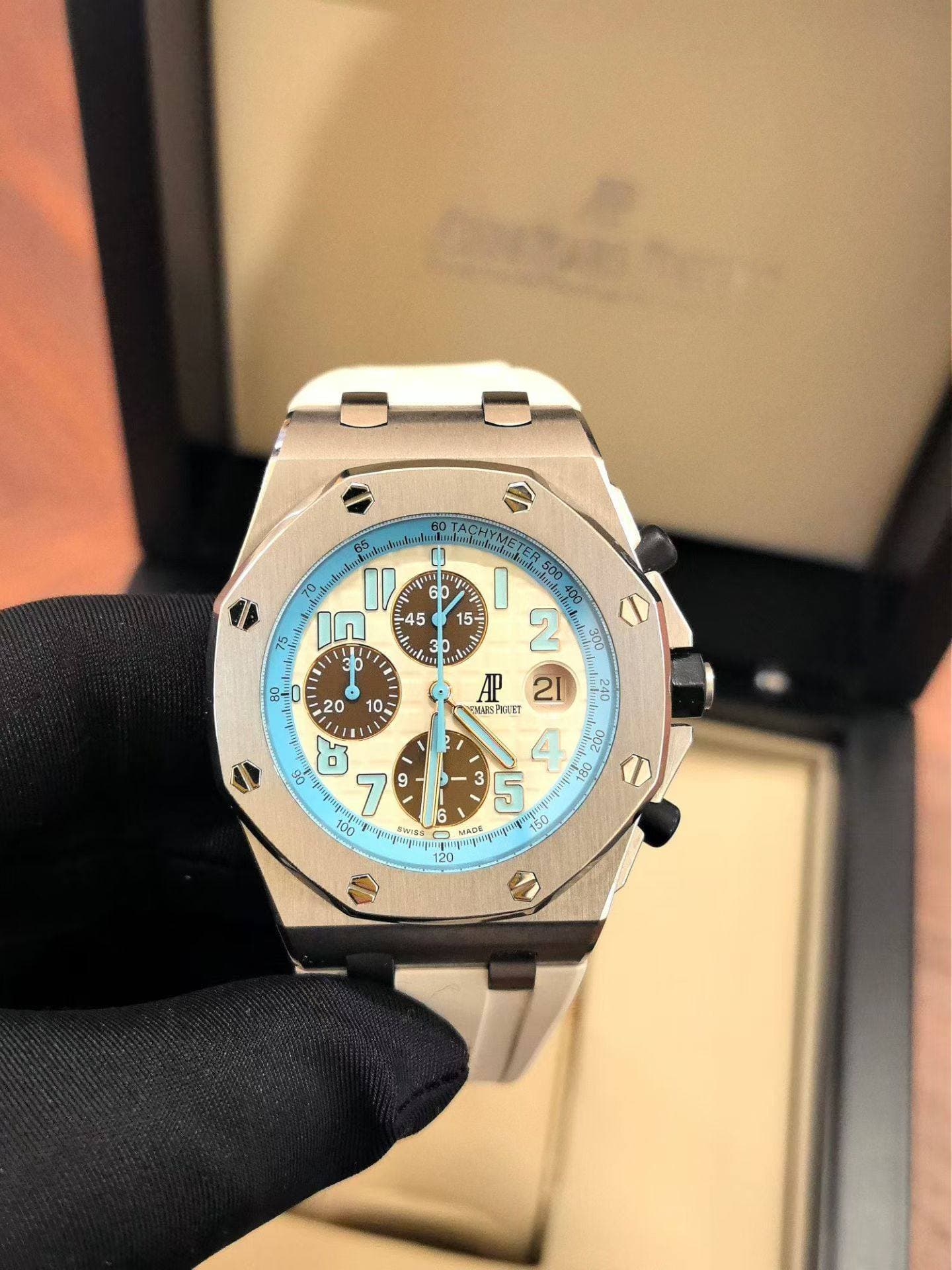 May be an image of wrist watch and text