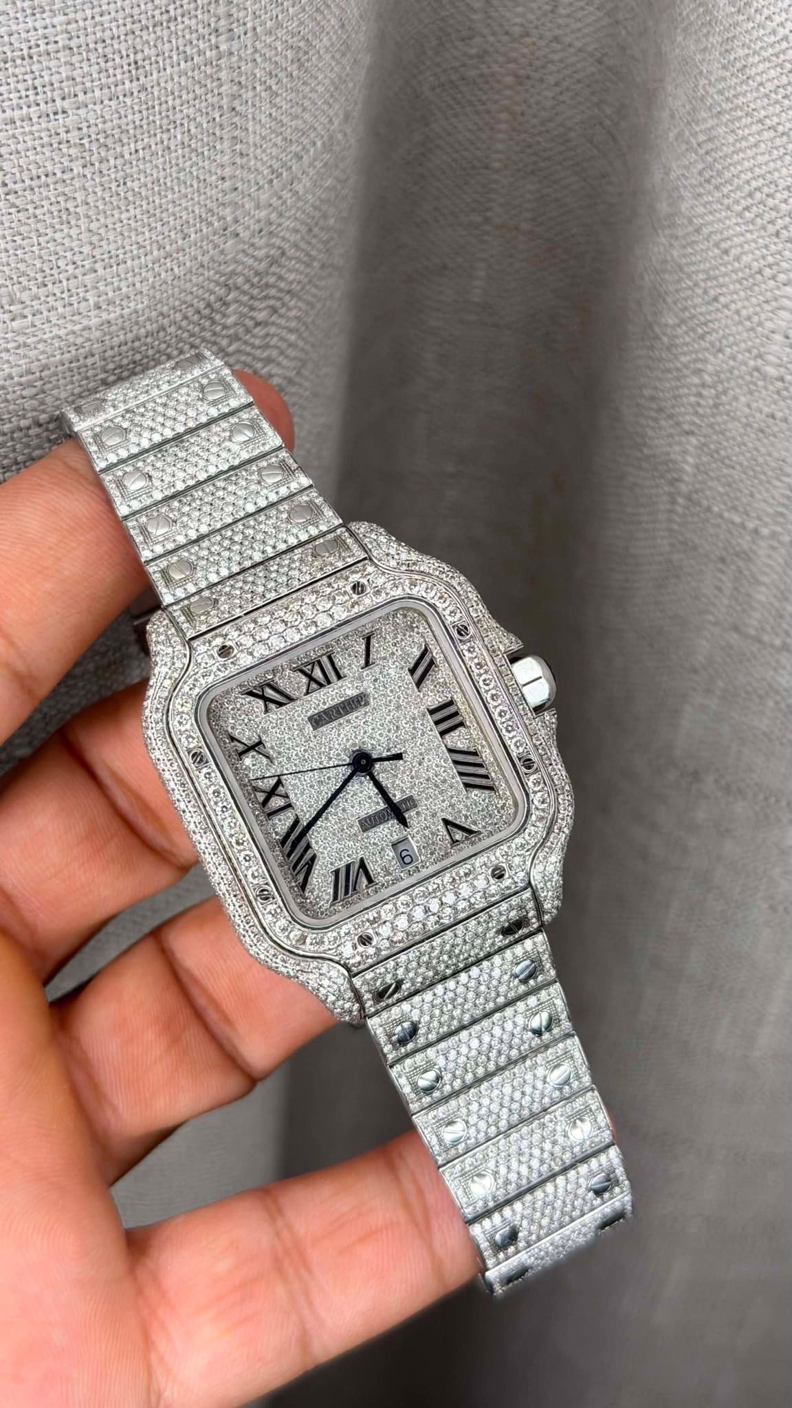 May be an image of wrist watch and text