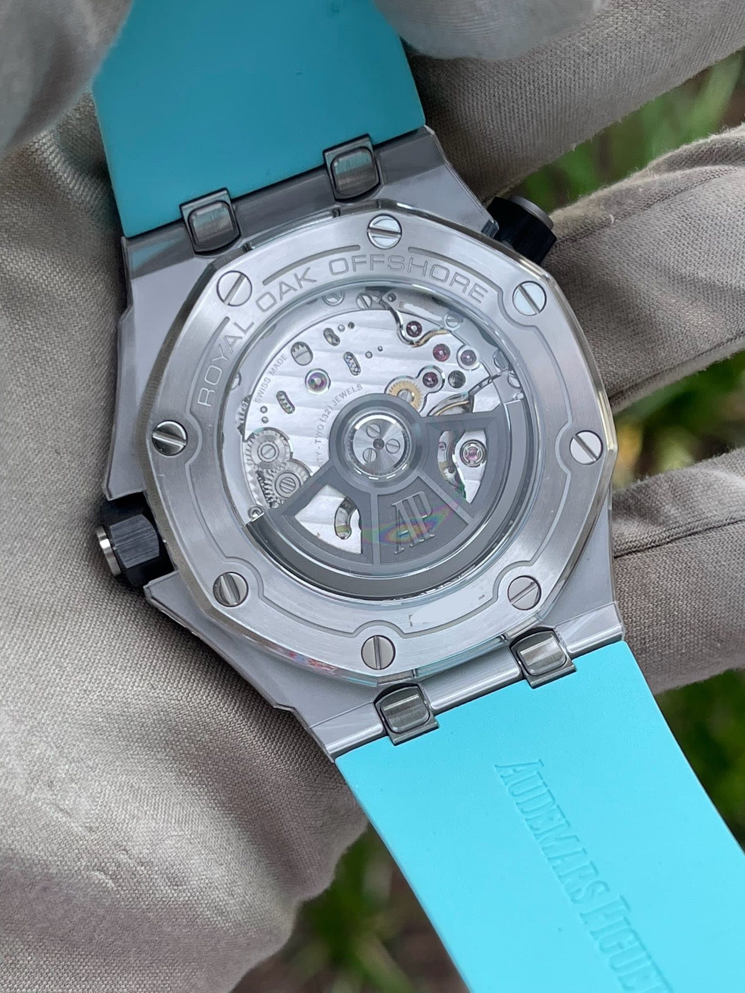 May be an image of wrist watch and text