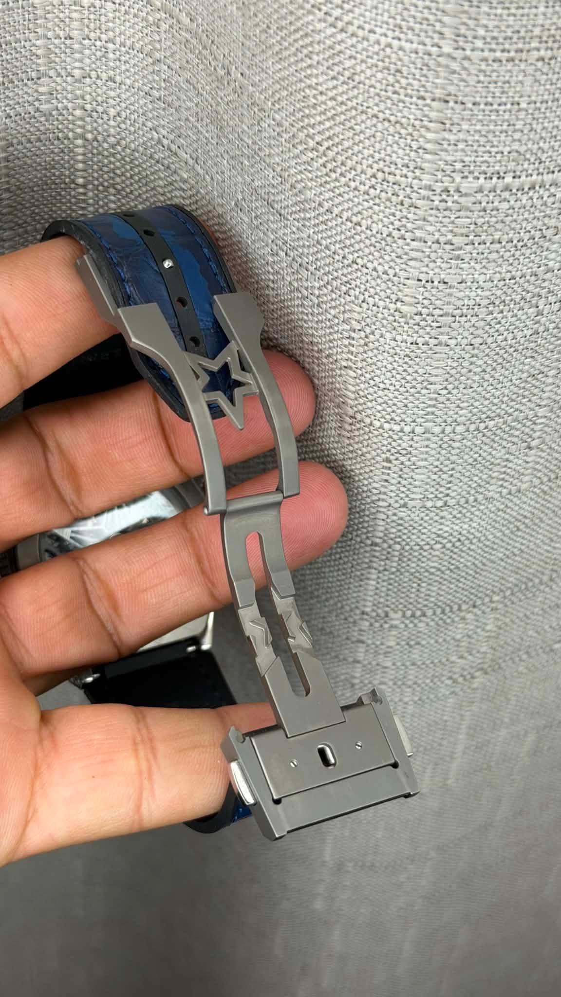 May be an image of wrist watch