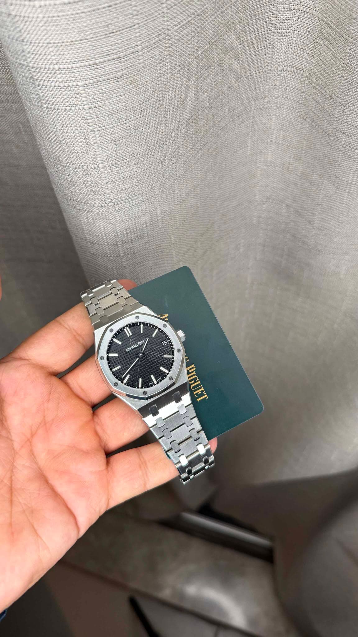 May be an image of wrist watch and text