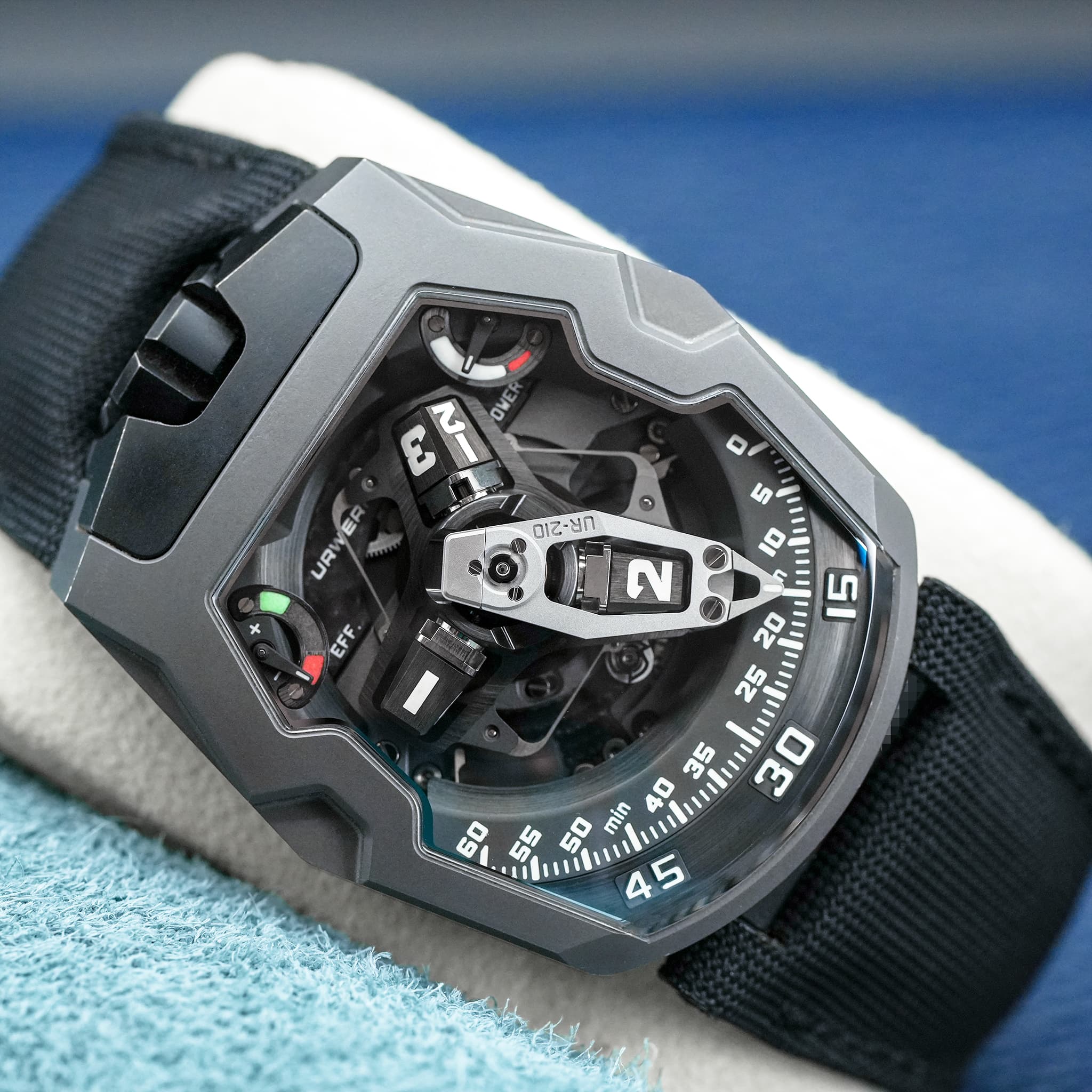 May be an image of wrist watch and text