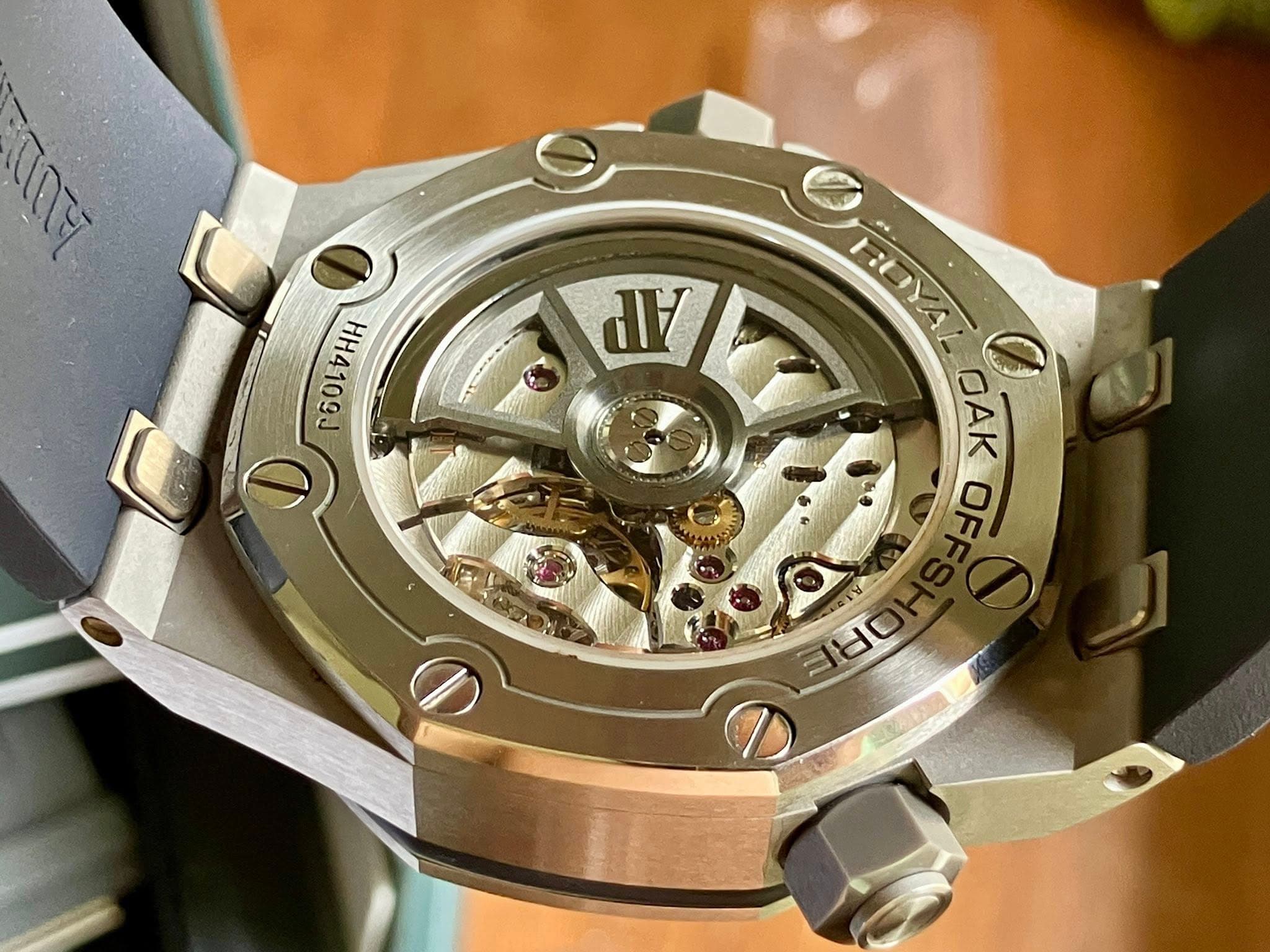 May be an image of wrist watch and text