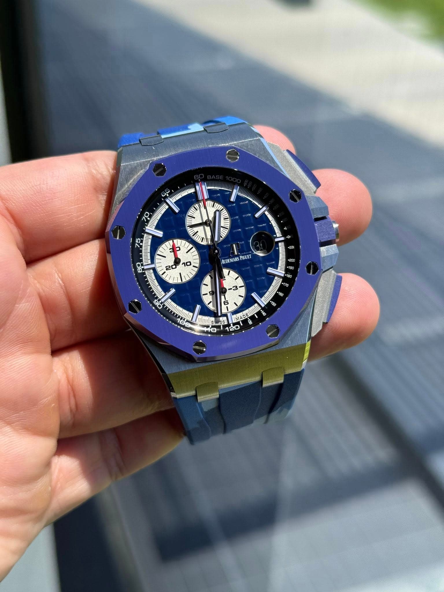 May be an image of wrist watch and text