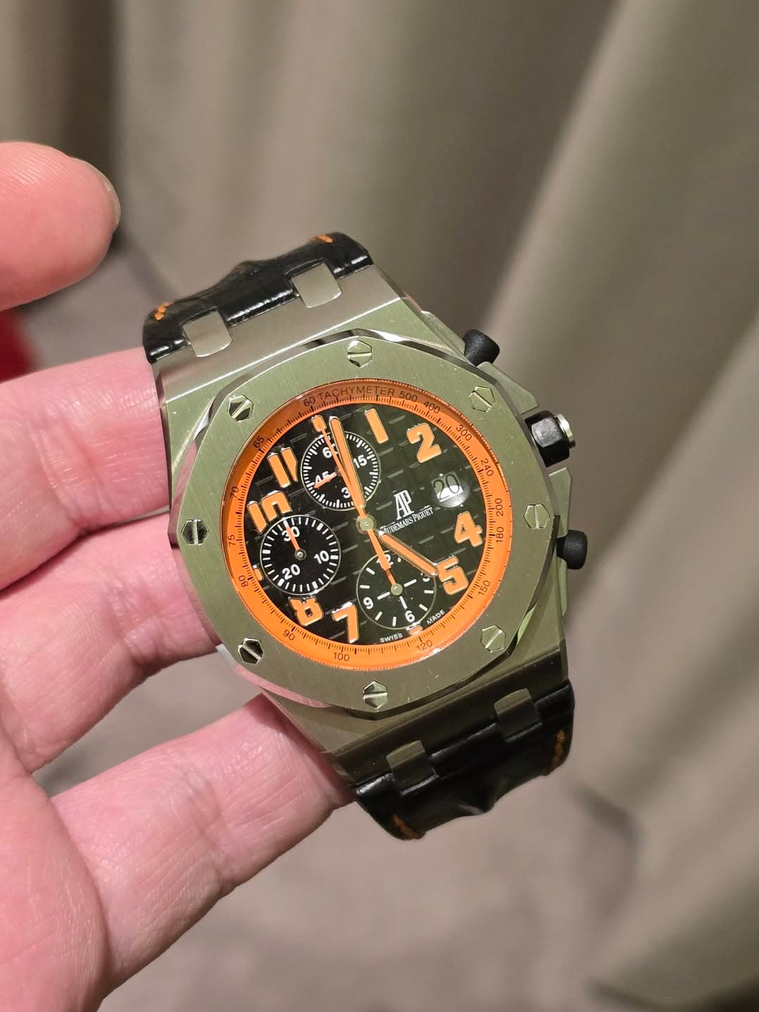 May be an image of digital watch and text