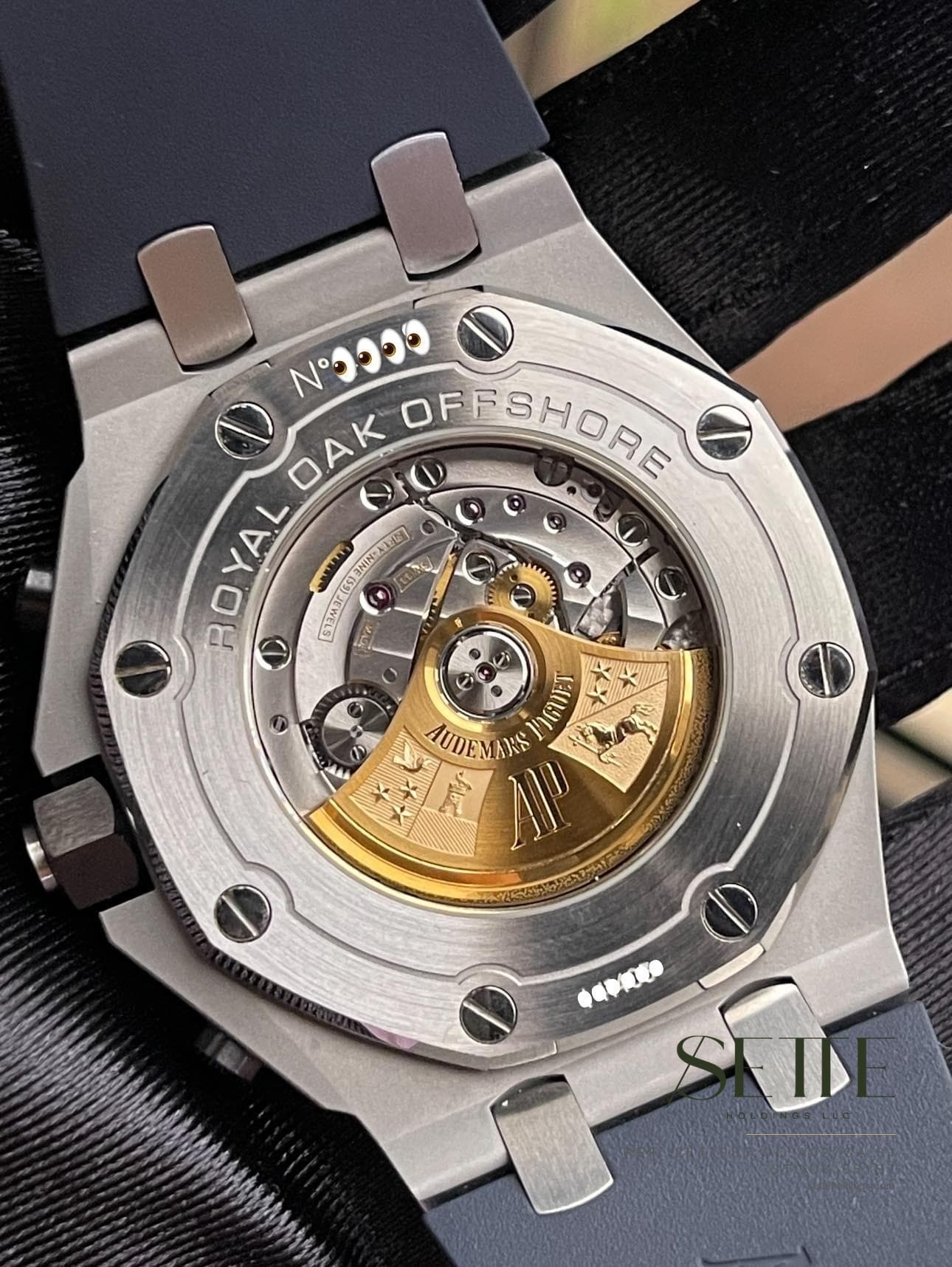 May be an image of wrist watch and text