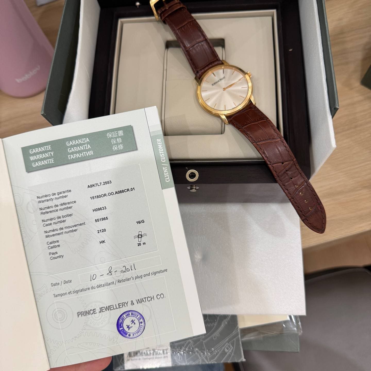 May be an image of wrist watch and text