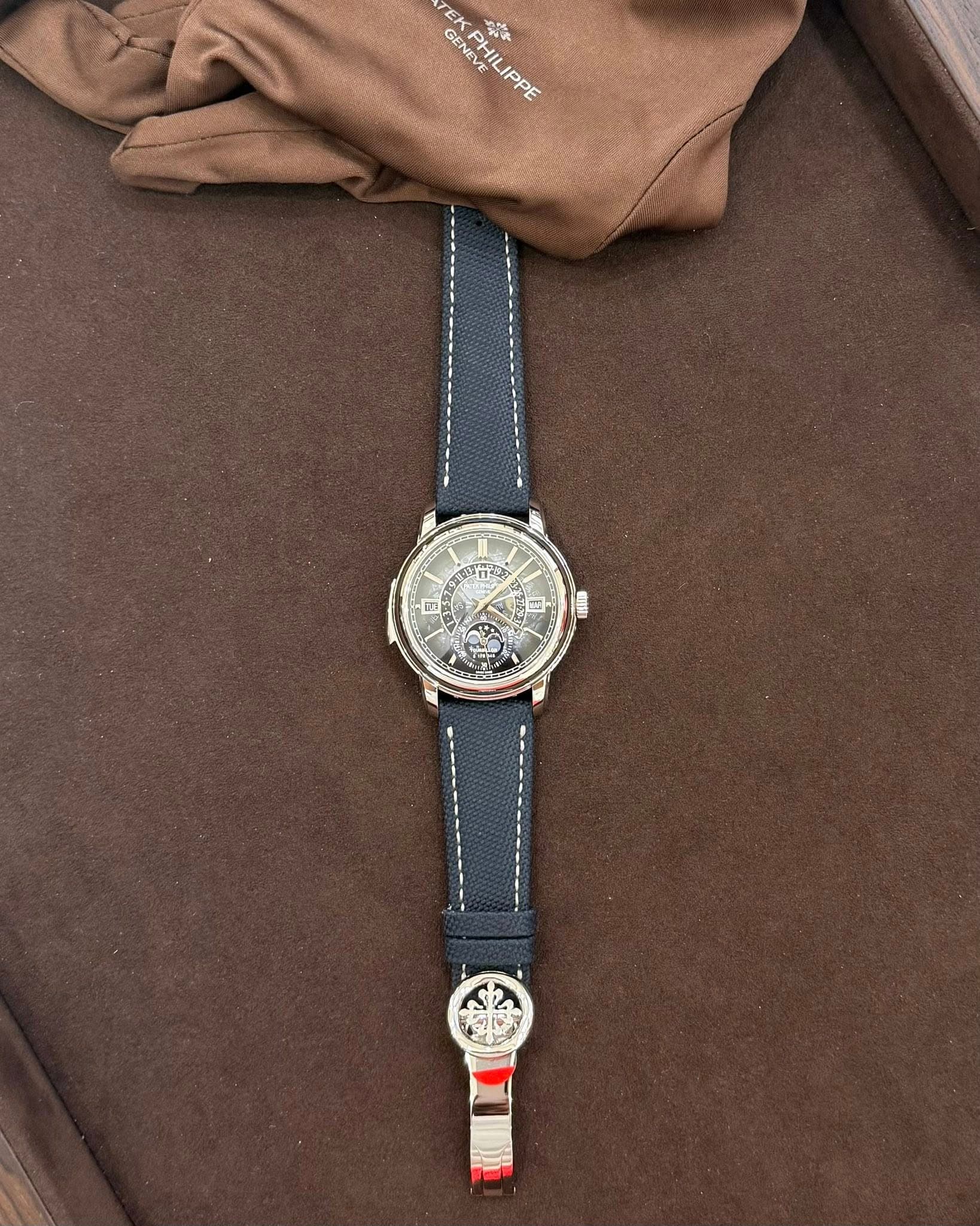 May be an image of wrist watch and text
