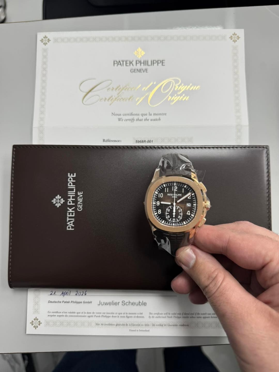 May be an image of wrist watch and text that says 'PATEK PHILIPPE GENEVE Cayf Cartfnt Opu rigin Nous certifions n que la montre W ccmlf watch Reférence: 5968R- ل AEK LIP 器…