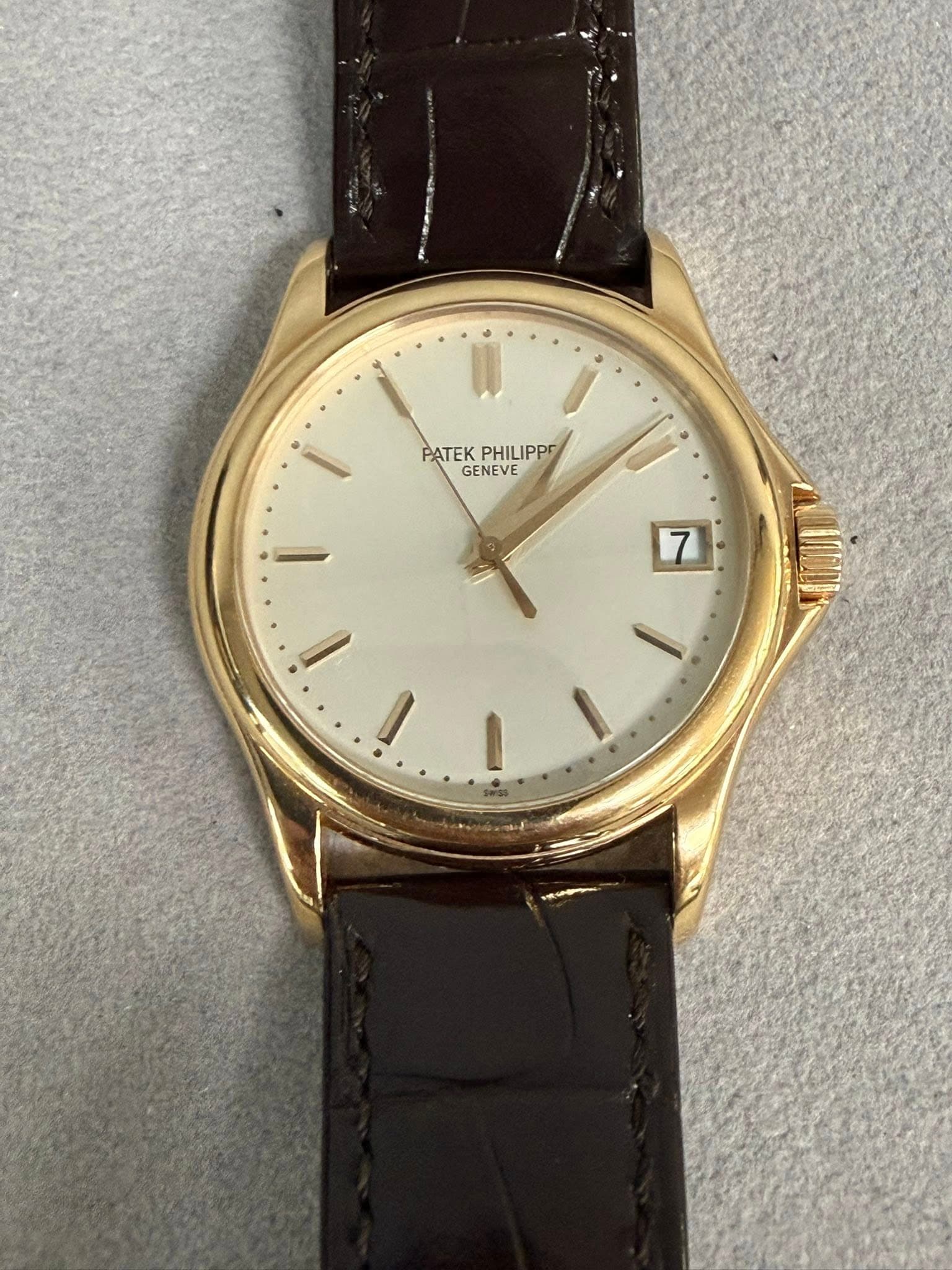 May be an image of wrist watch and text that says 'PATEK PATEKPHILIPPR PHILIPPE GENEVE 7'