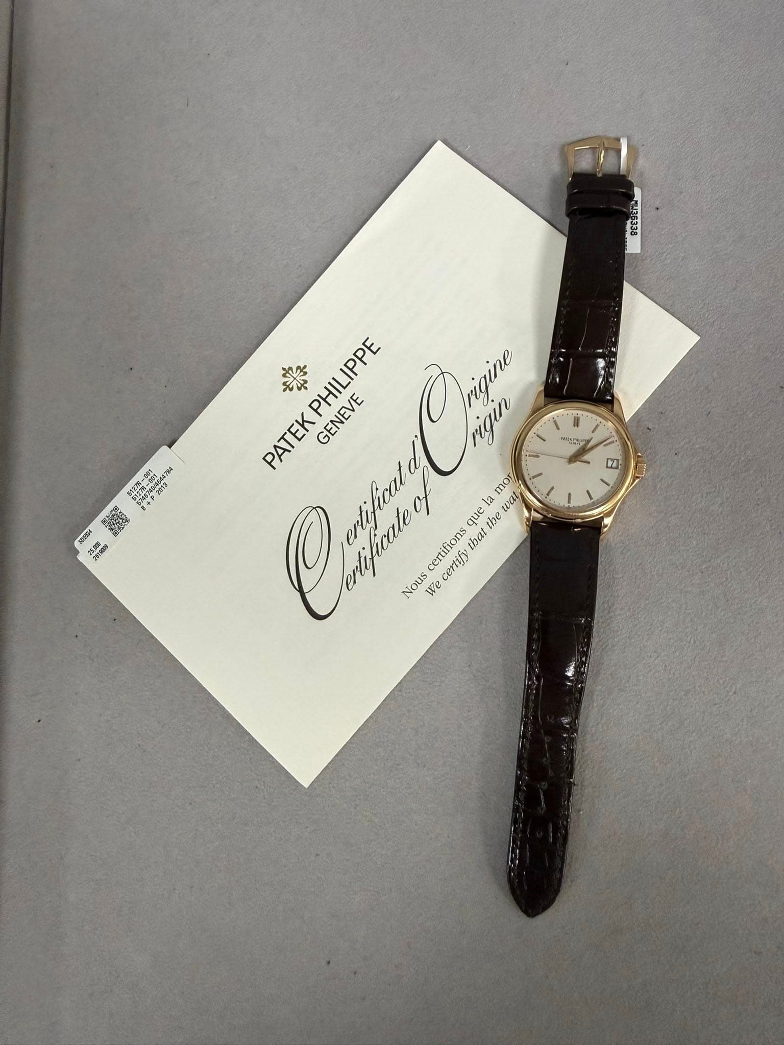 May be an image of wrist watch and text that says '" 0ま 2012 メッンン B Ocфpи the ንዳ leaa weat PATEKPHILIPPE 樂 PHILIPPE Castang PATEK GENEVE rigin m mor uel la certifions that certijy…