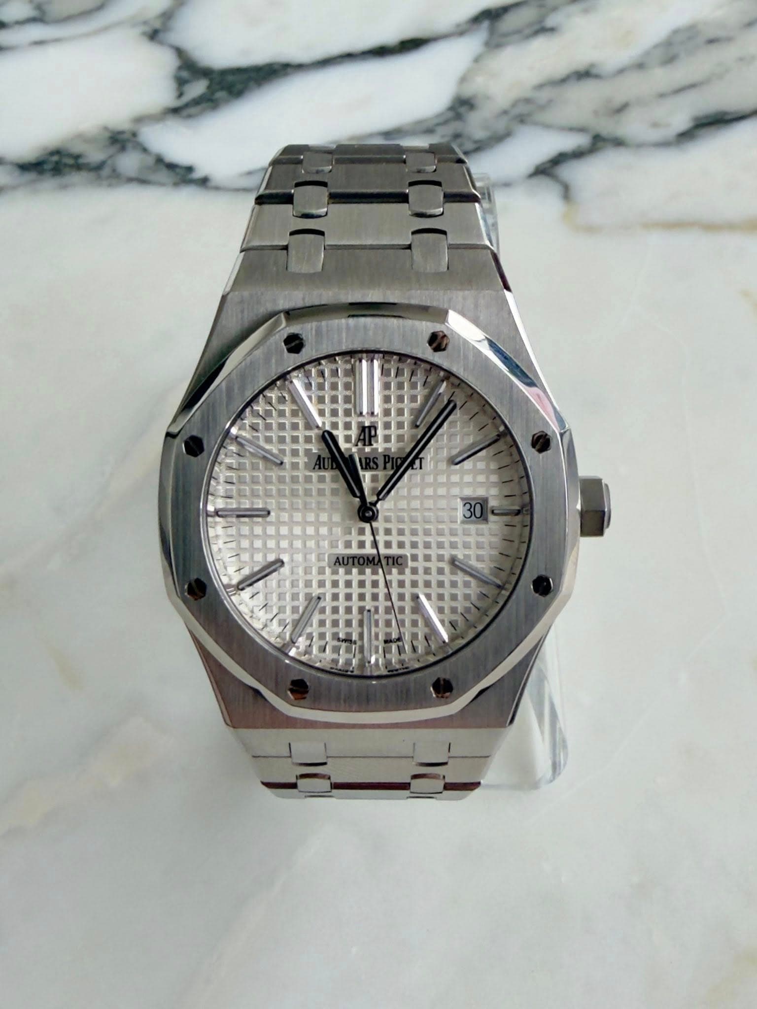 May be an image of wrist watch