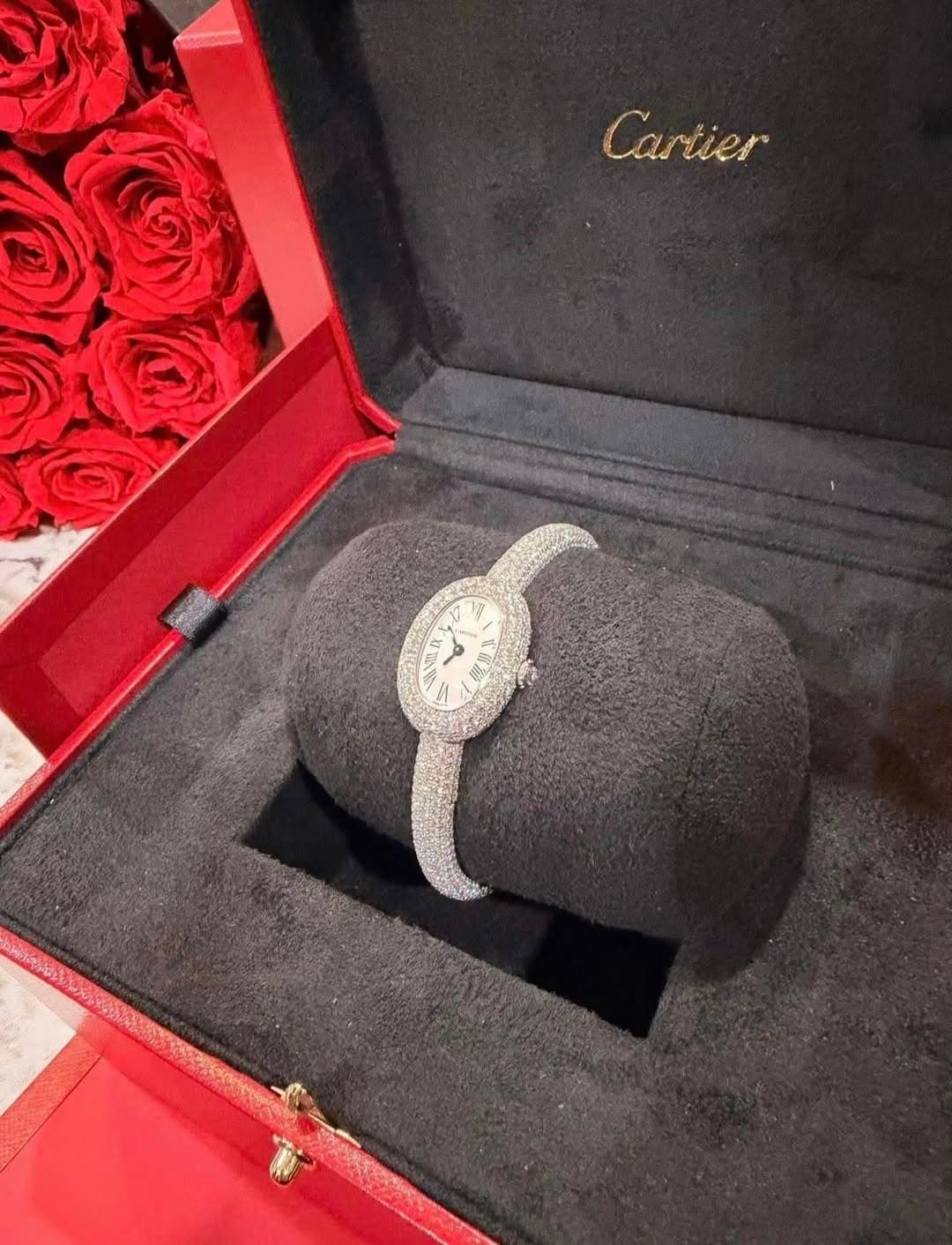 May be an image of ring, wrist watch and text