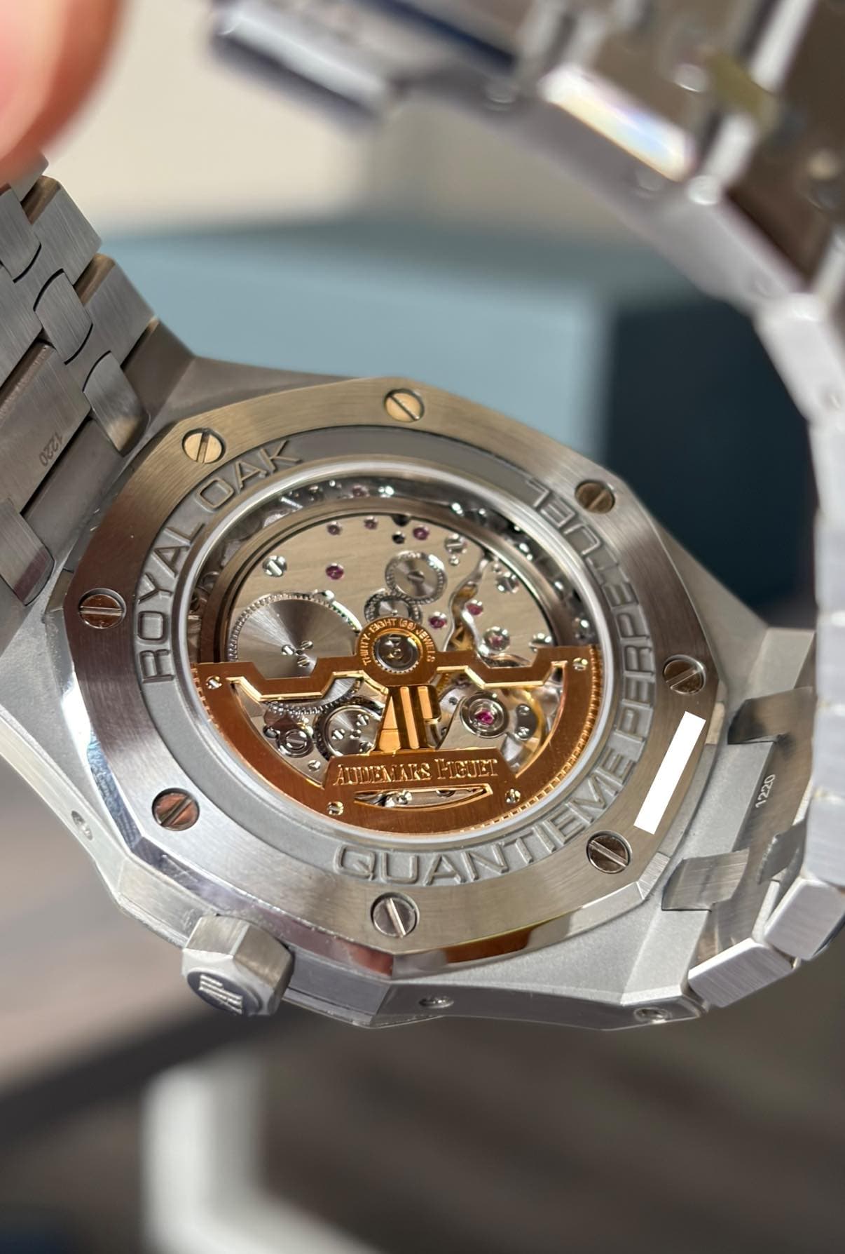 May be an image of wrist watch and text