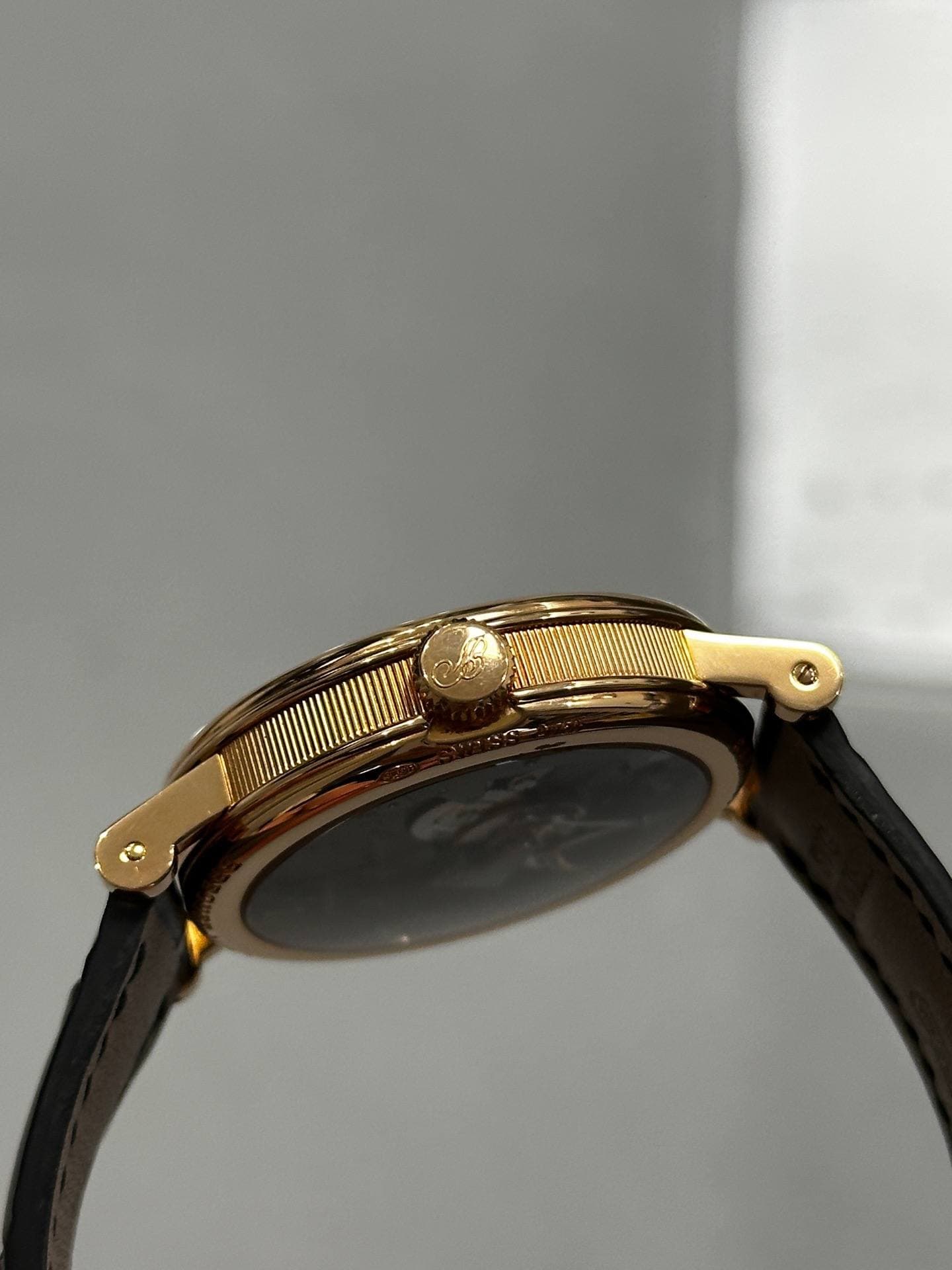May be an image of wrist watch