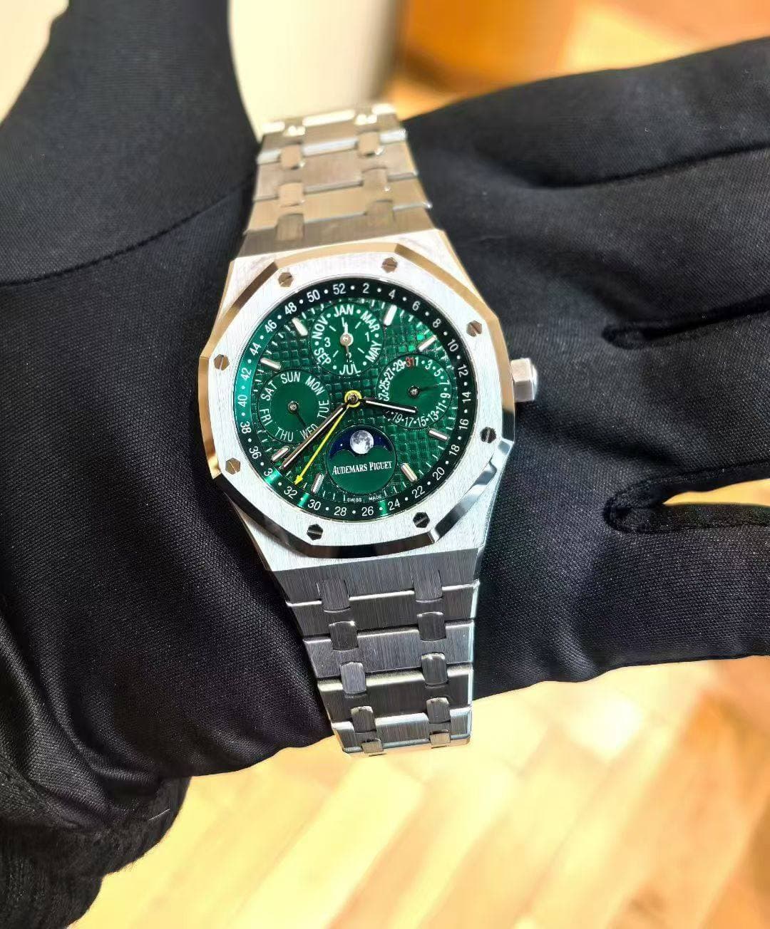 May be an image of wrist watch and text