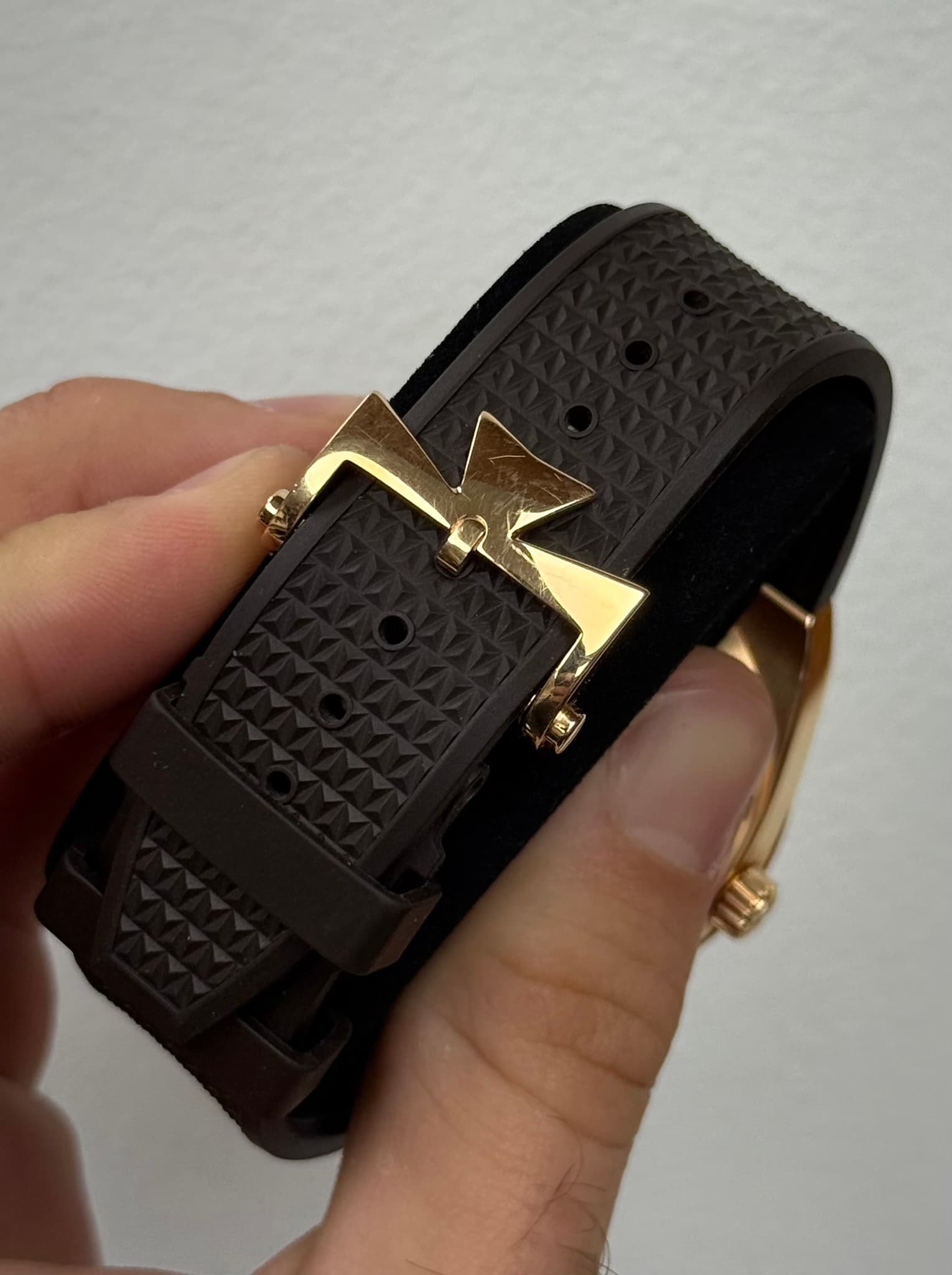 May be an image of leather and digital watch