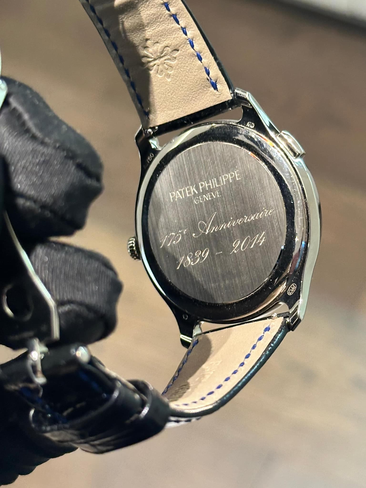 May be an image of digital watch and text that says 'PHILIPPE PATEK PATEKPHILIPPE GENEVE ايدء Anniverauire ጋዱይ'