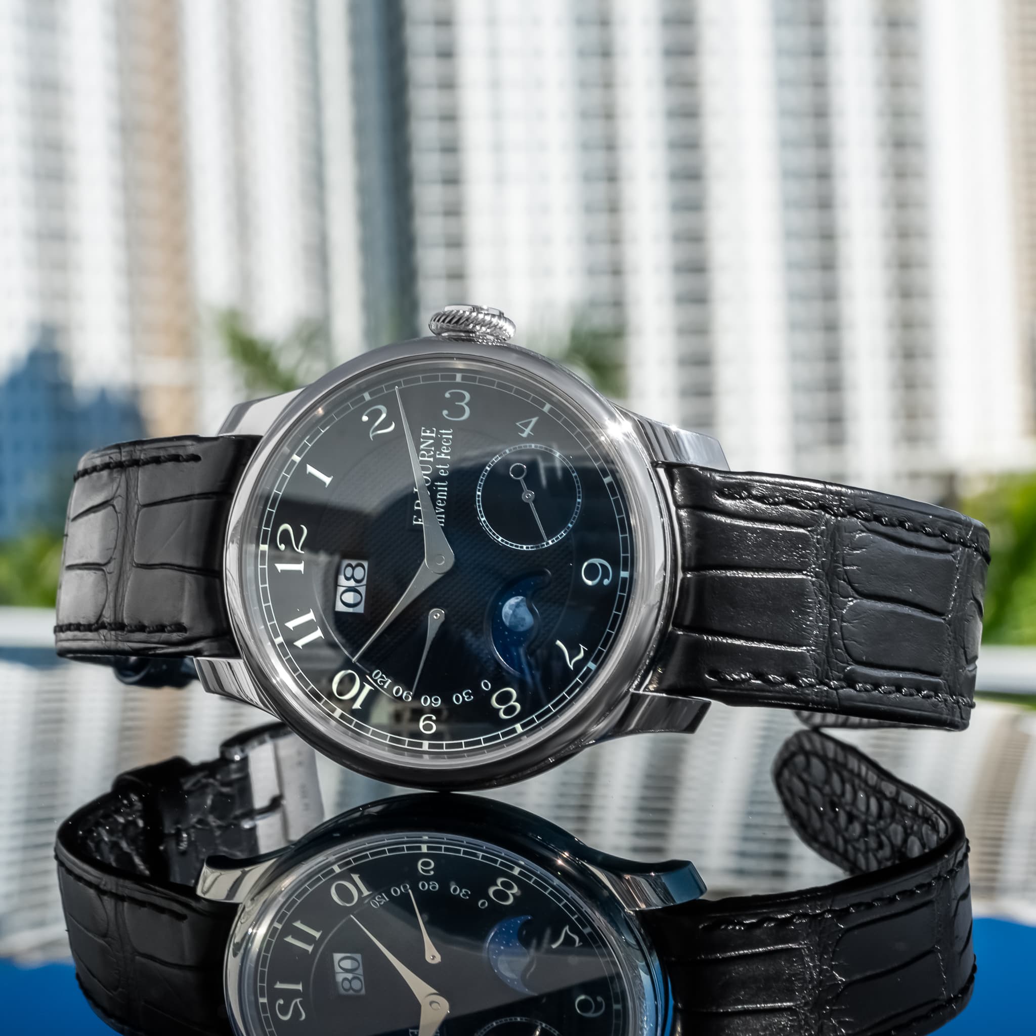 May be an image of wrist watch and text