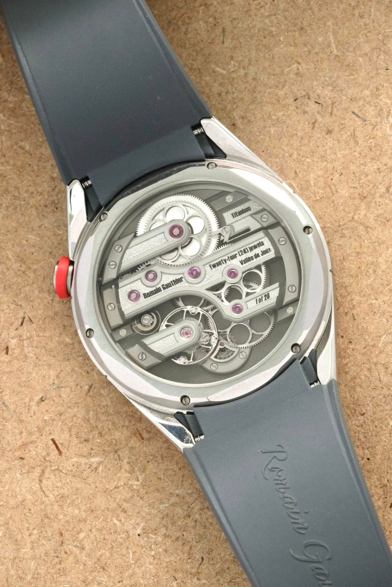 May be an image of wrist watch and text