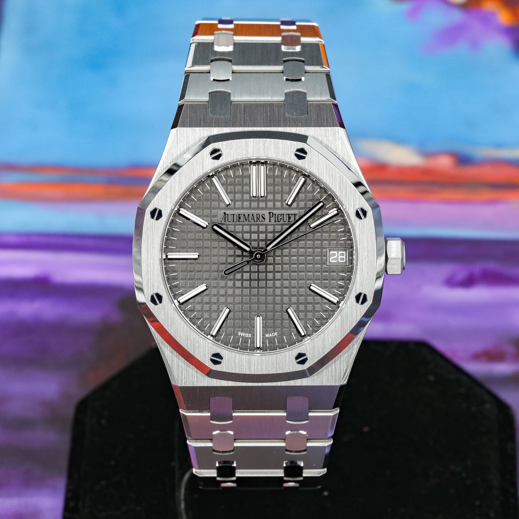 May be an image of wrist watch and text
