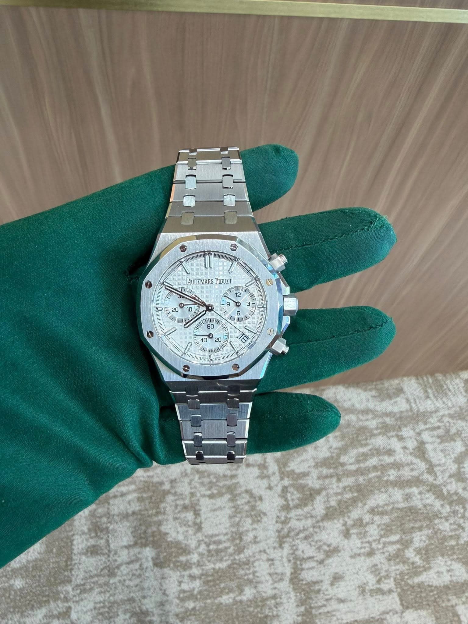 May be an image of wrist watch and text