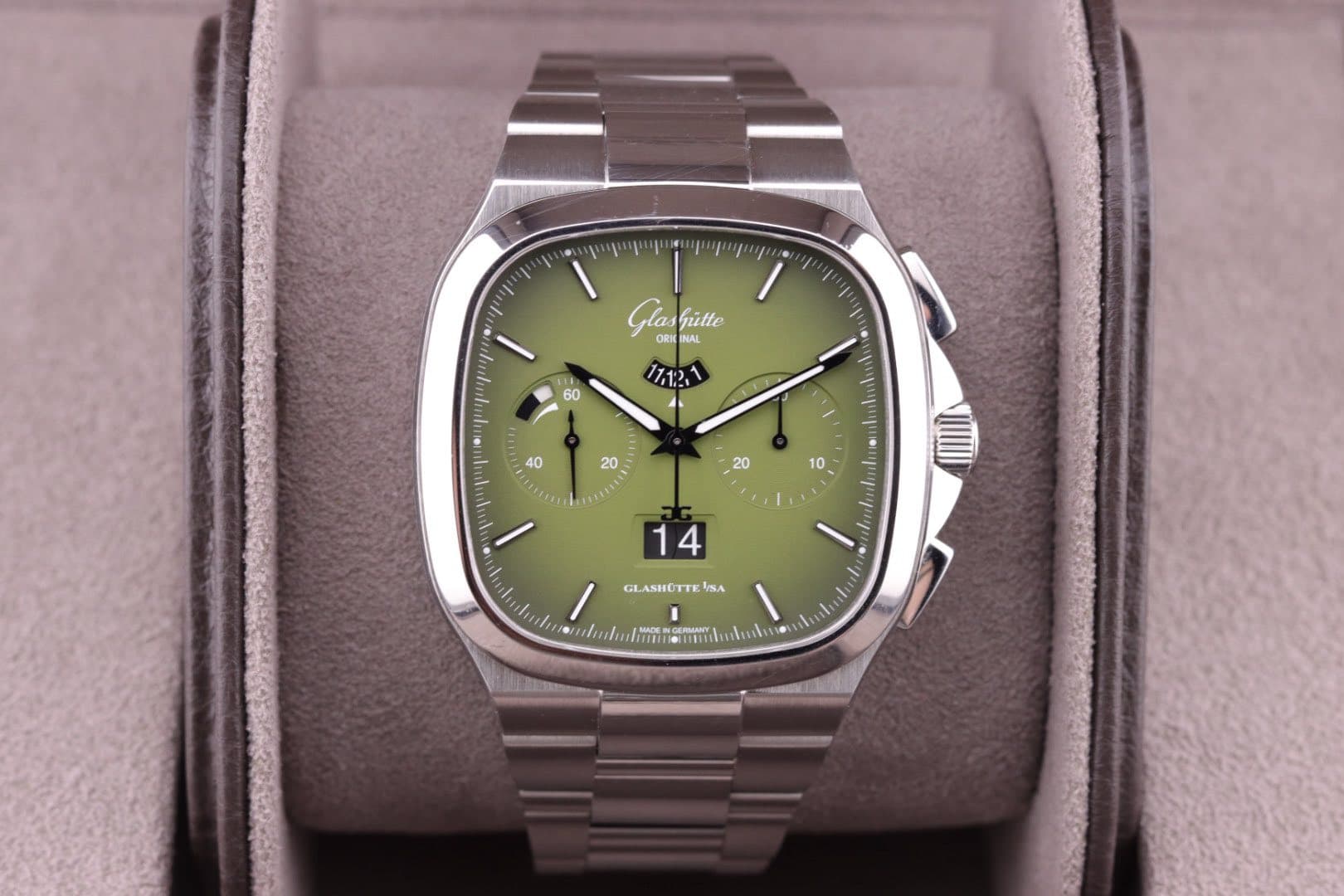May be an image of wrist watch and text