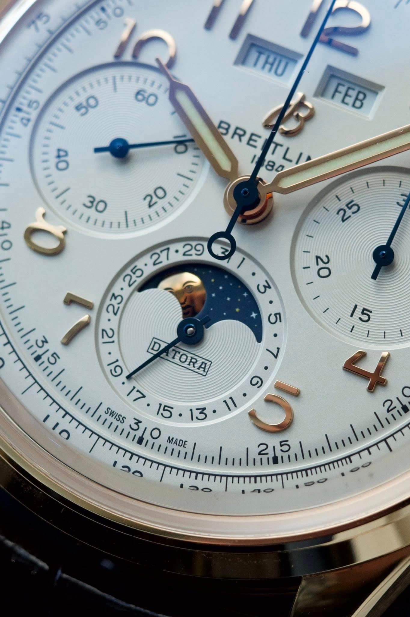 May be an image of wrist watch and text that says 'សយា I ㅎ TAU THU BREITLD TLD 80 BRE d3 FEB ١ လ 61 DATORA D TORA 17 SWISS 15.13 15• 13 11 O 15 4 MADE 25 IO 140'