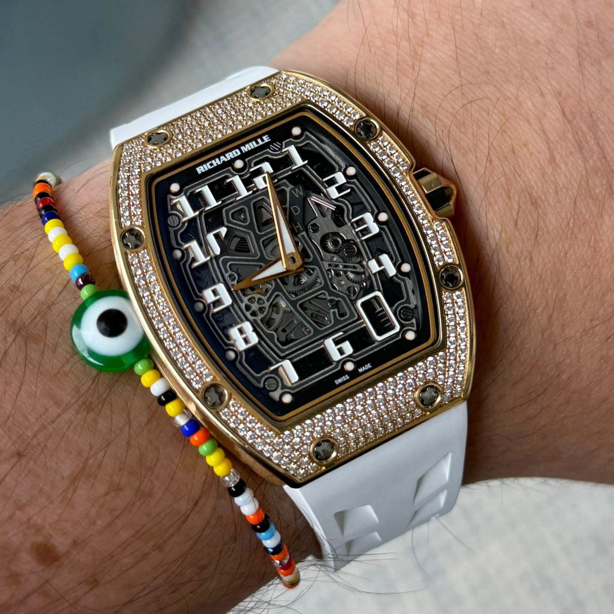 May be an image of wrist watch and text