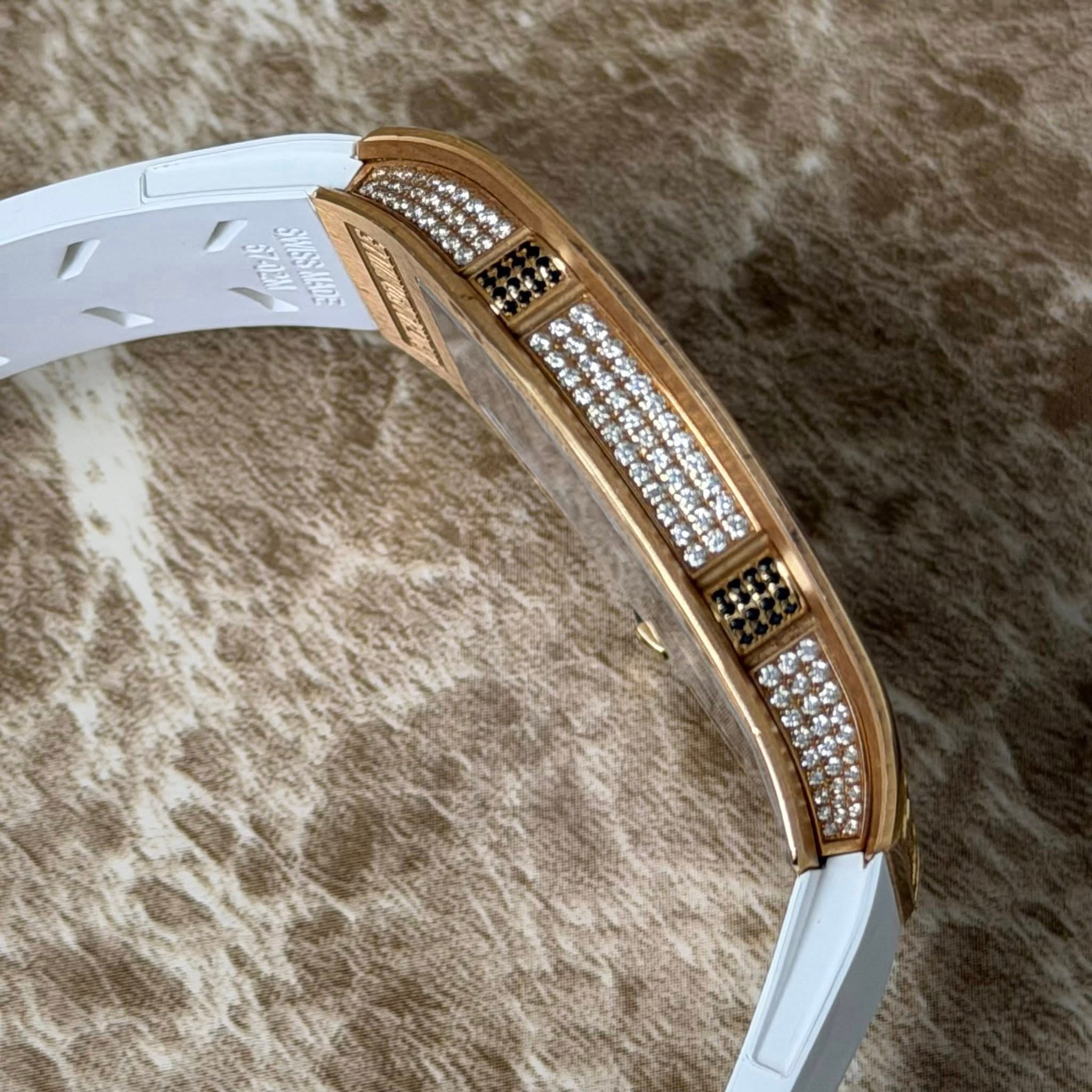 May be an image of wrist watch and jewelry