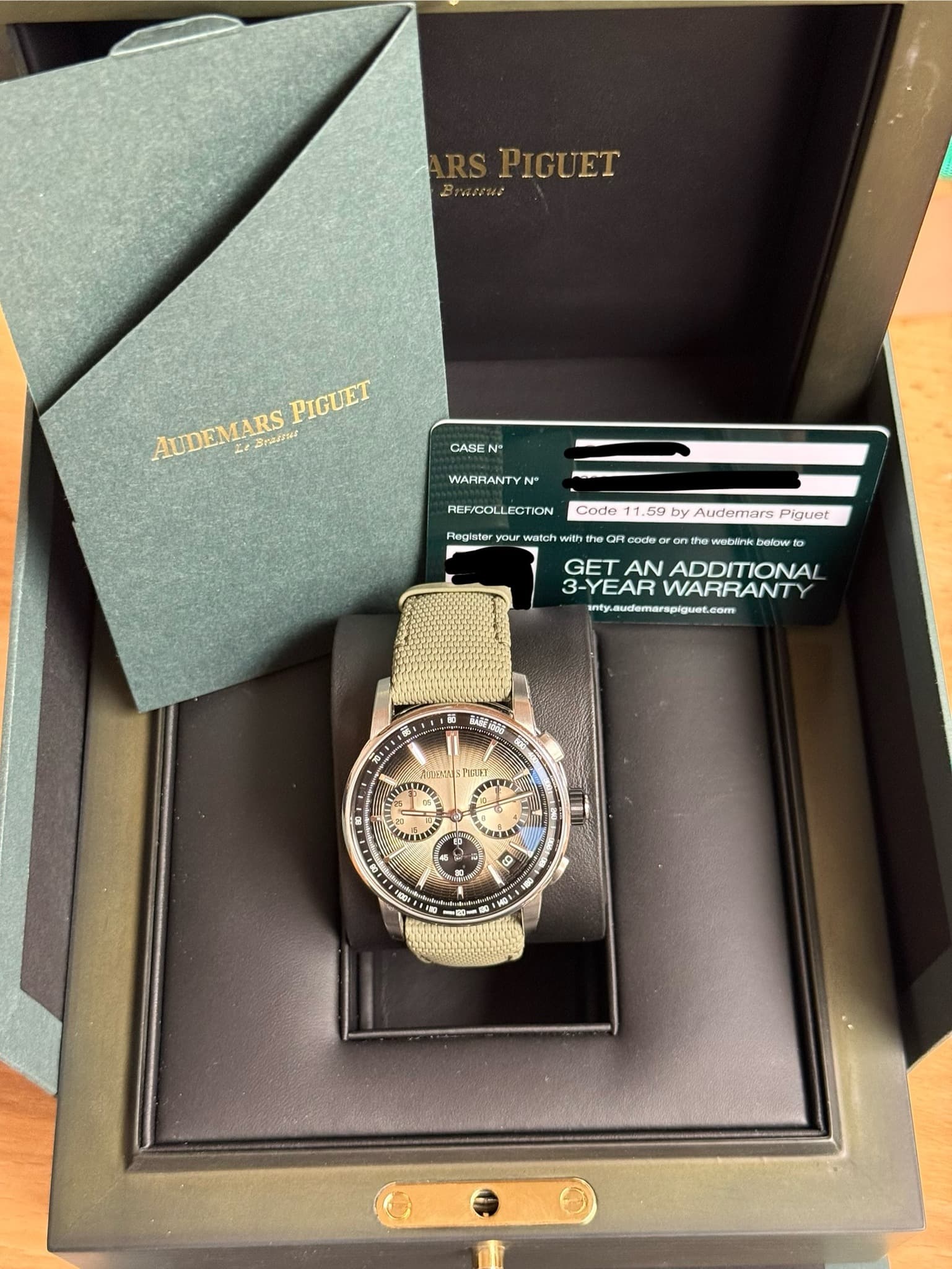 May be an image of wrist watch and text that says 'PIGUET Bnaceue PIGUET AUDEMARS ی Sisares CASE WARRANTYN* N REF/CO REF/COLLECTION Codo 1. 59 59 by Audemars Piguet Register…