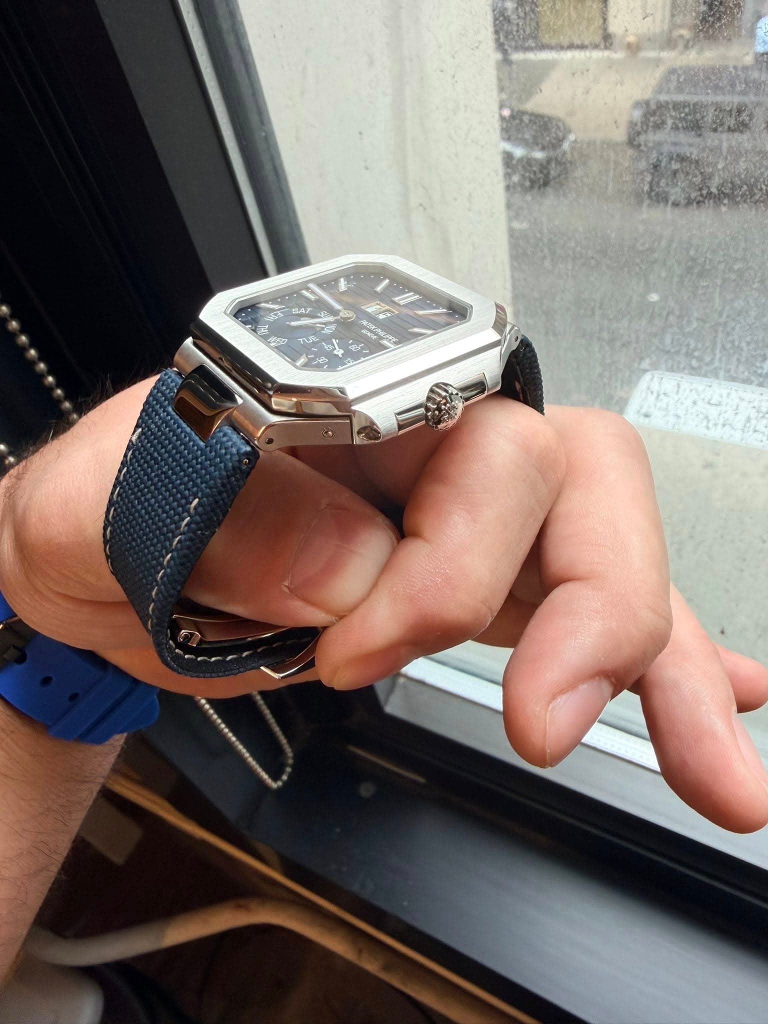 May be an image of digital watch and text