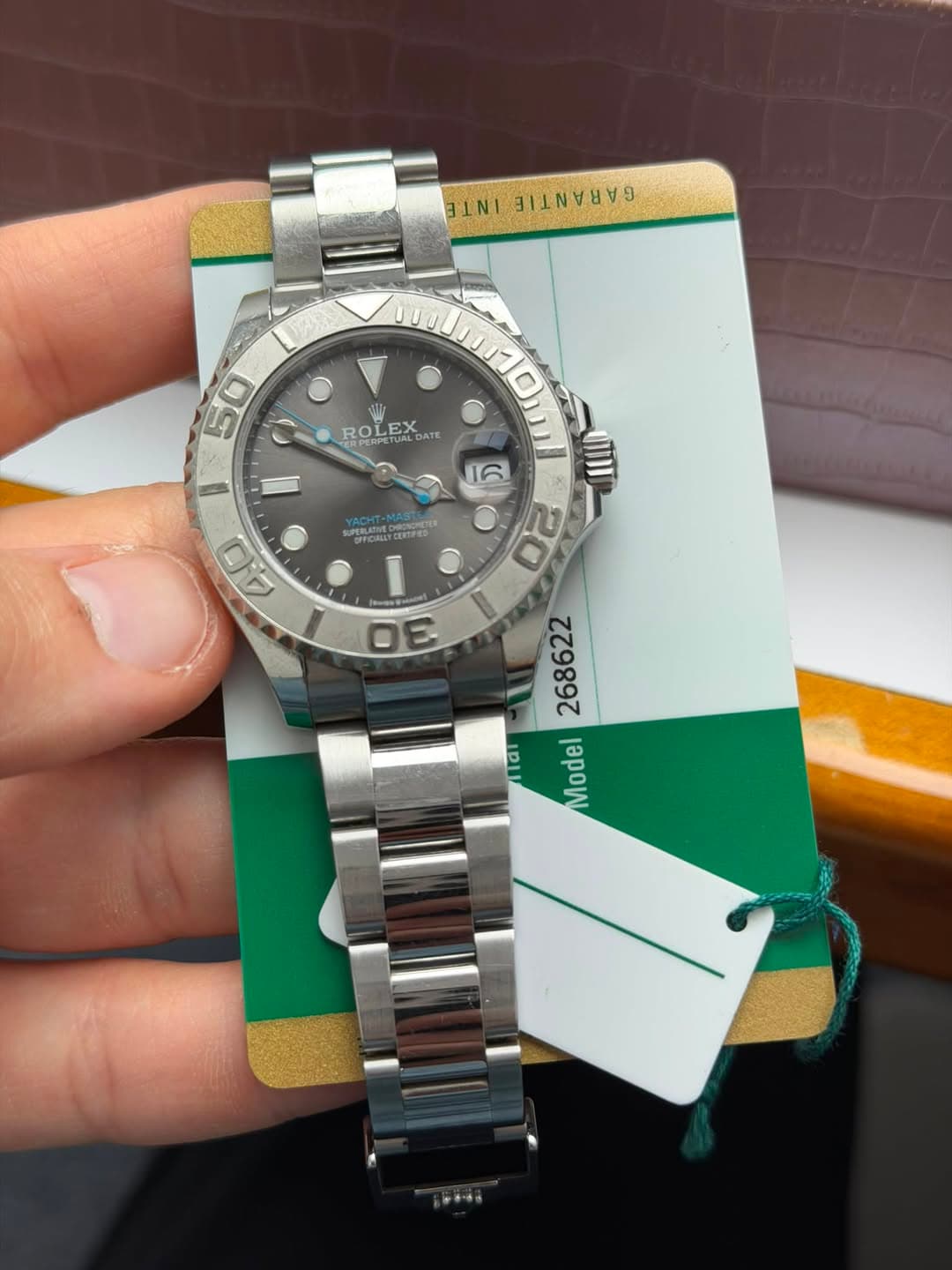 May be an image of wrist watch and text