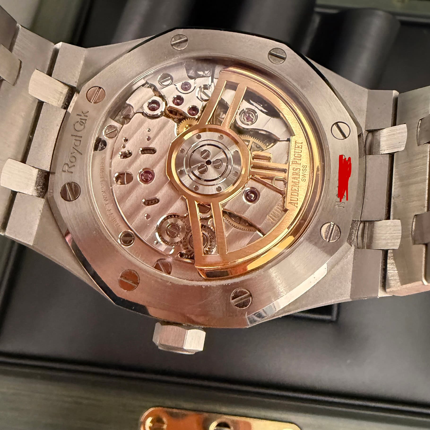 May be an image of wrist watch and text