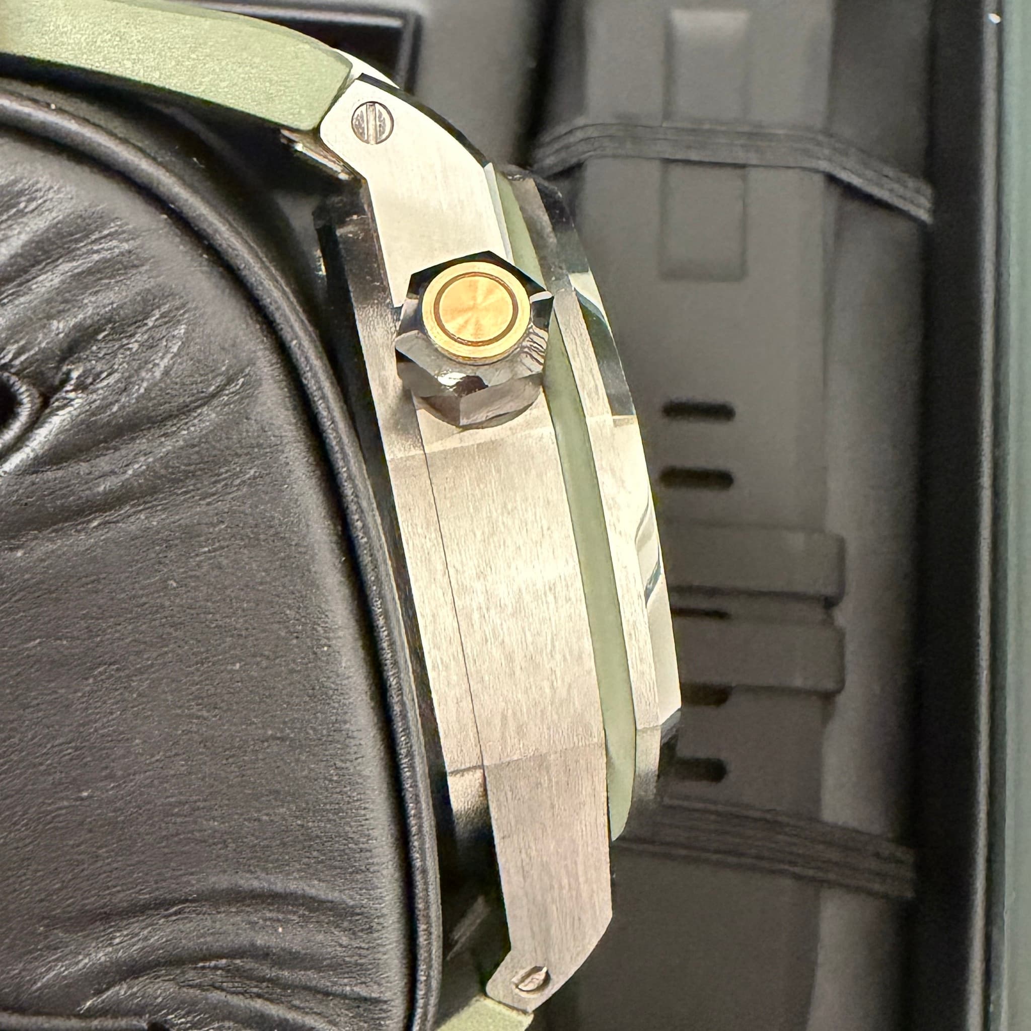 May be an image of suitcase and wrist watch