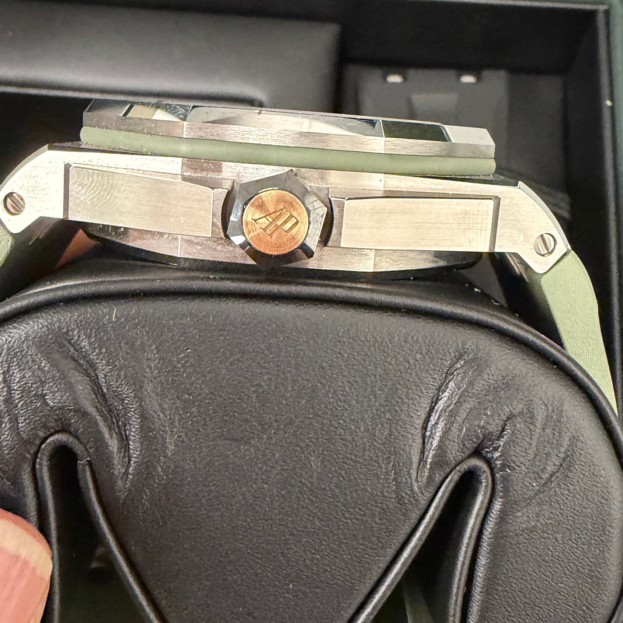 May be an image of wrist watch and knife