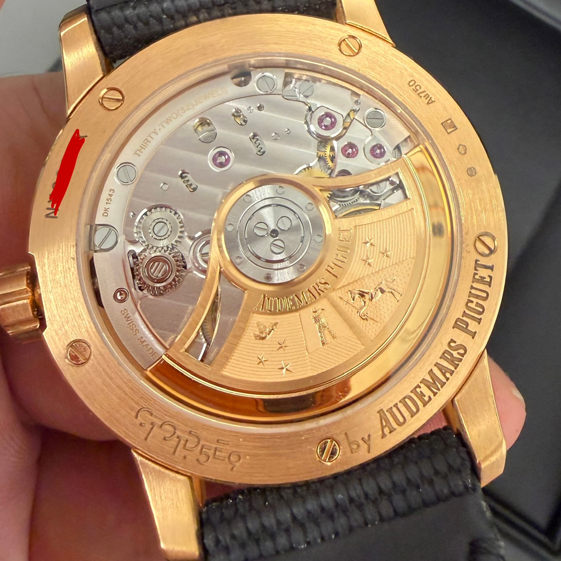 May be an image of wrist watch and text