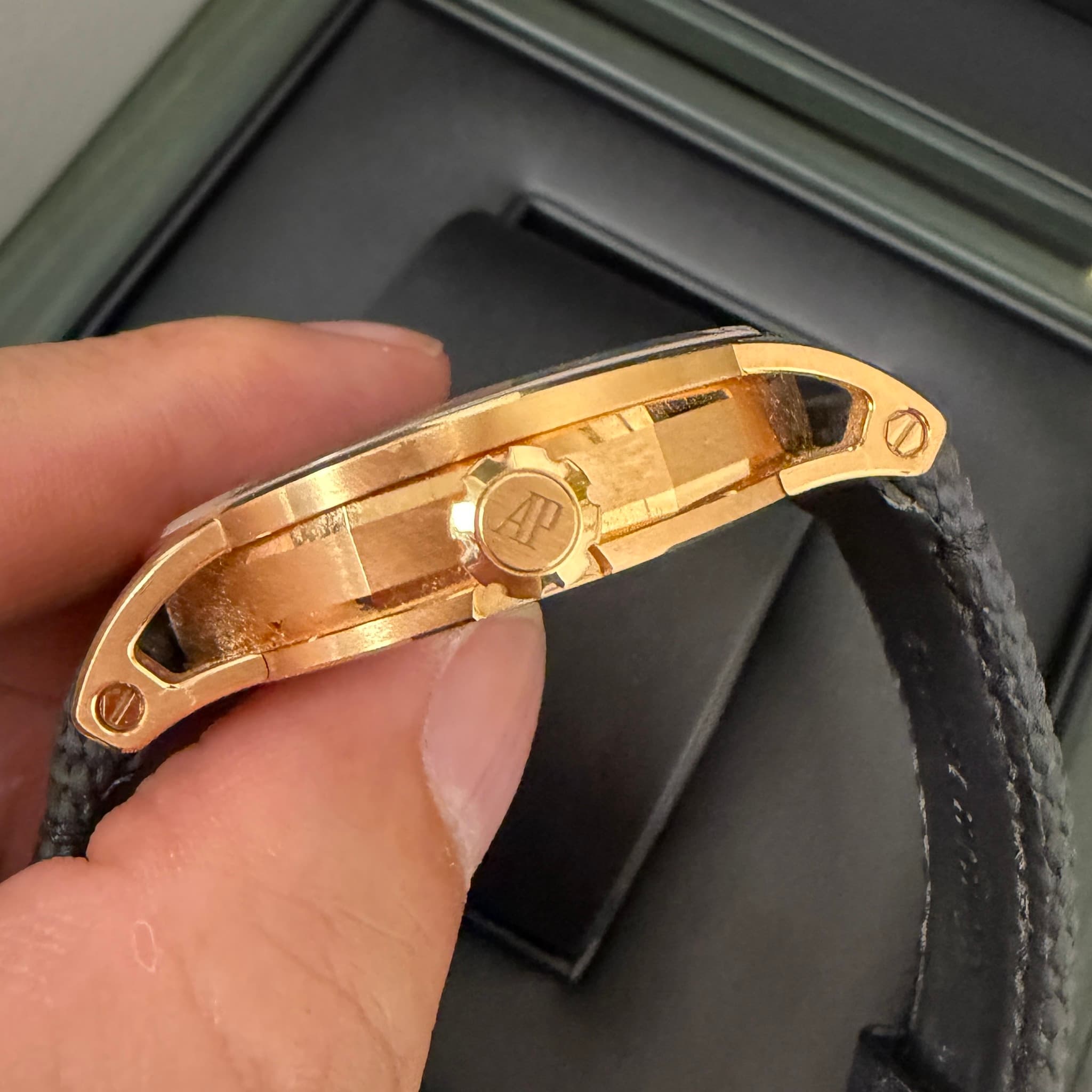 May be an image of wrist watch and text