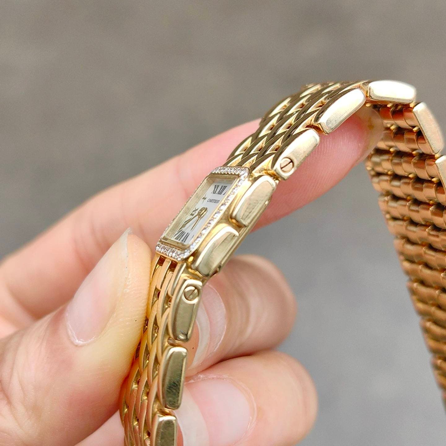 May be an image of wrist watch and jewelry